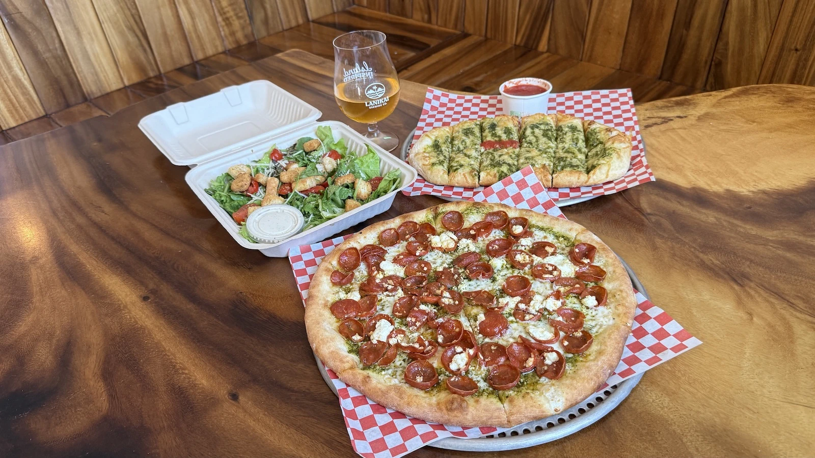 Lanikai Brewing Co. offers locally made beers and brick fire pizzas