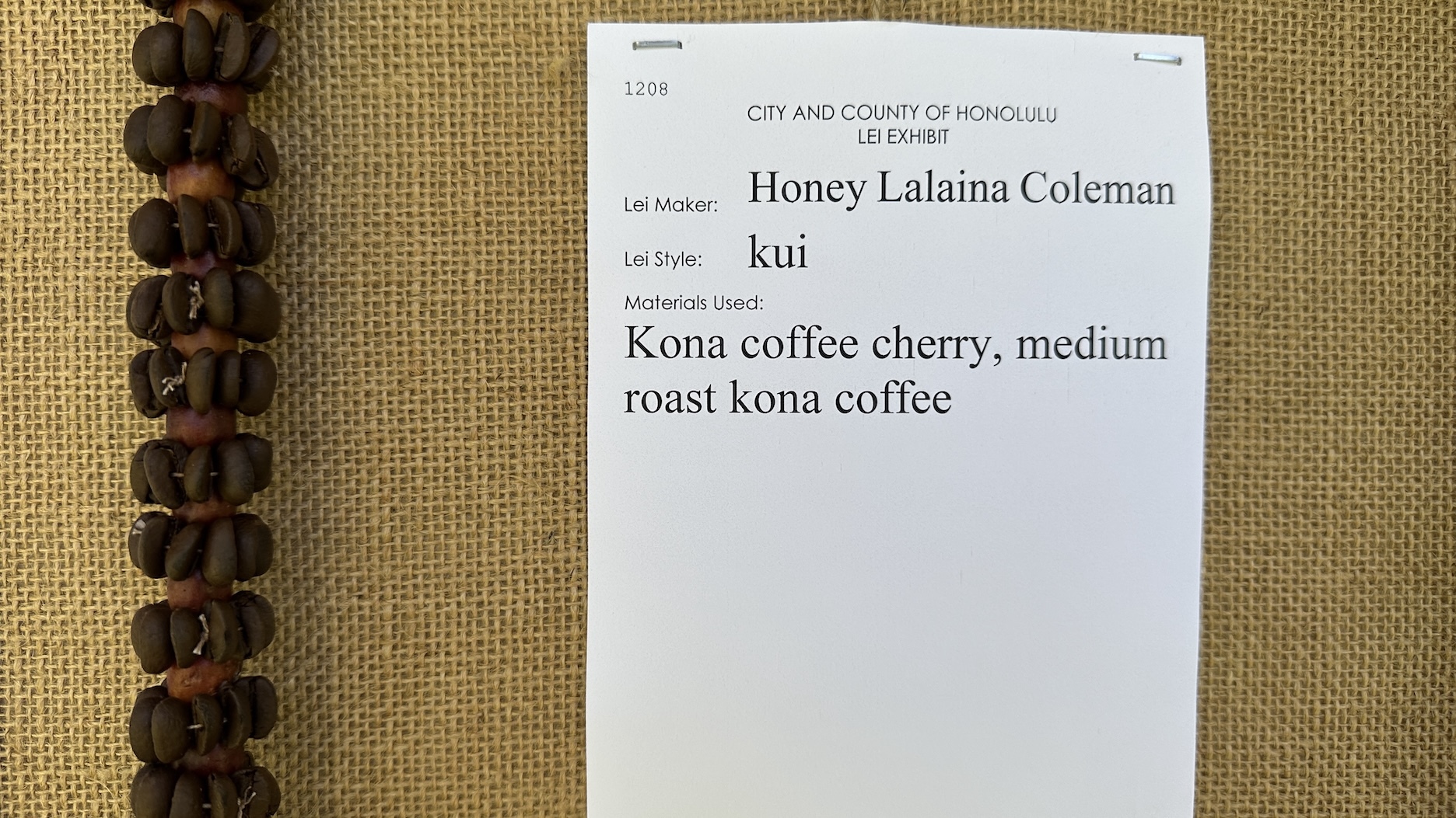 A closer view of the lei made from Kona coffee cherry.