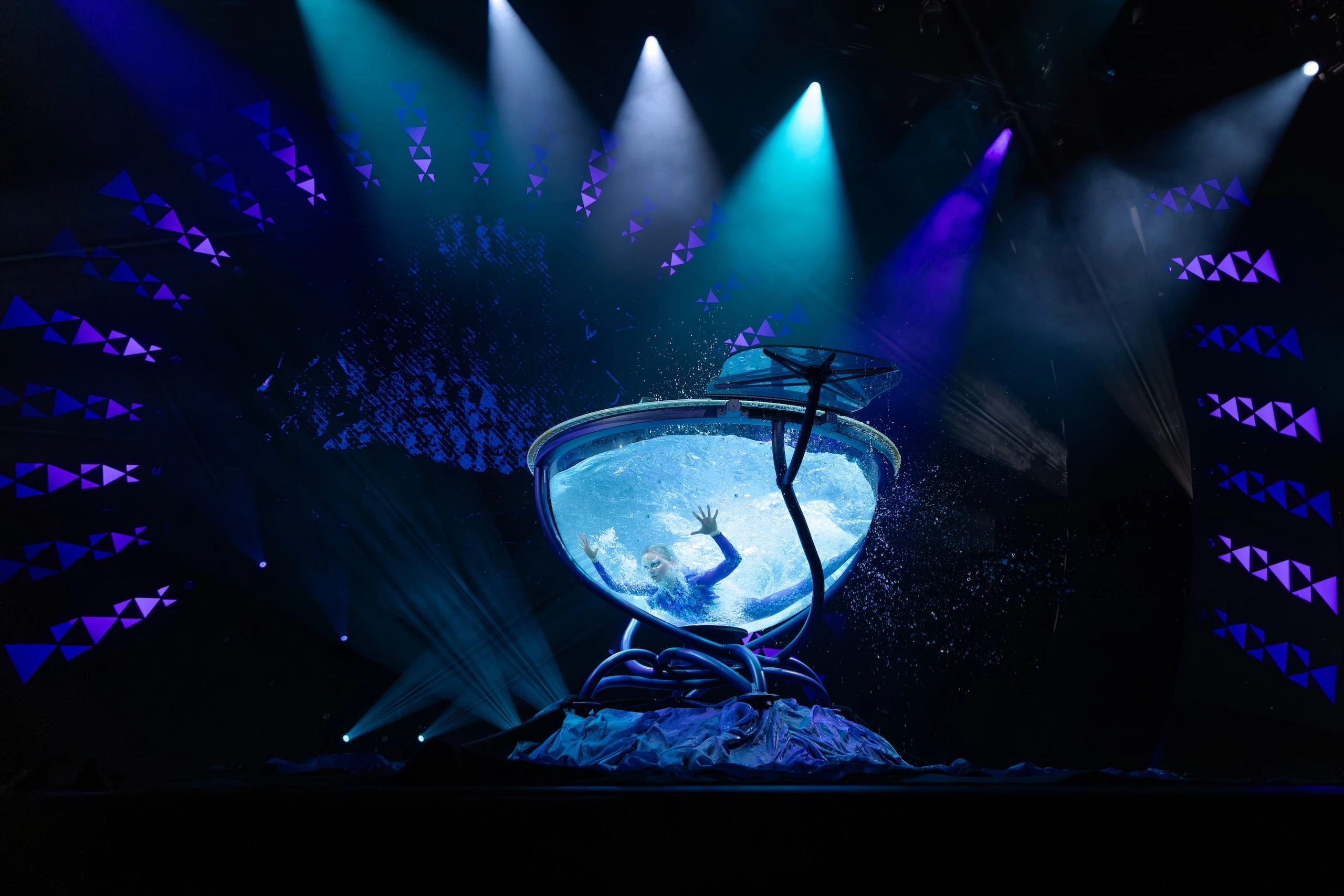 The water bowl scene features Mālama, a woman and powerful moʻo.