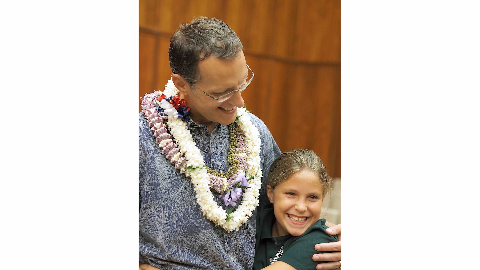 Turnbull celebrates becoming a U.S. citizen in 2015 with his daughter, Gabrielle, who graduated in 2022.