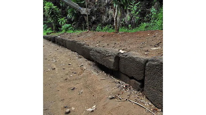 The stones of the great irrigation ditch of Kīkī-a-Ola were carved and fitted together by the Menehune.