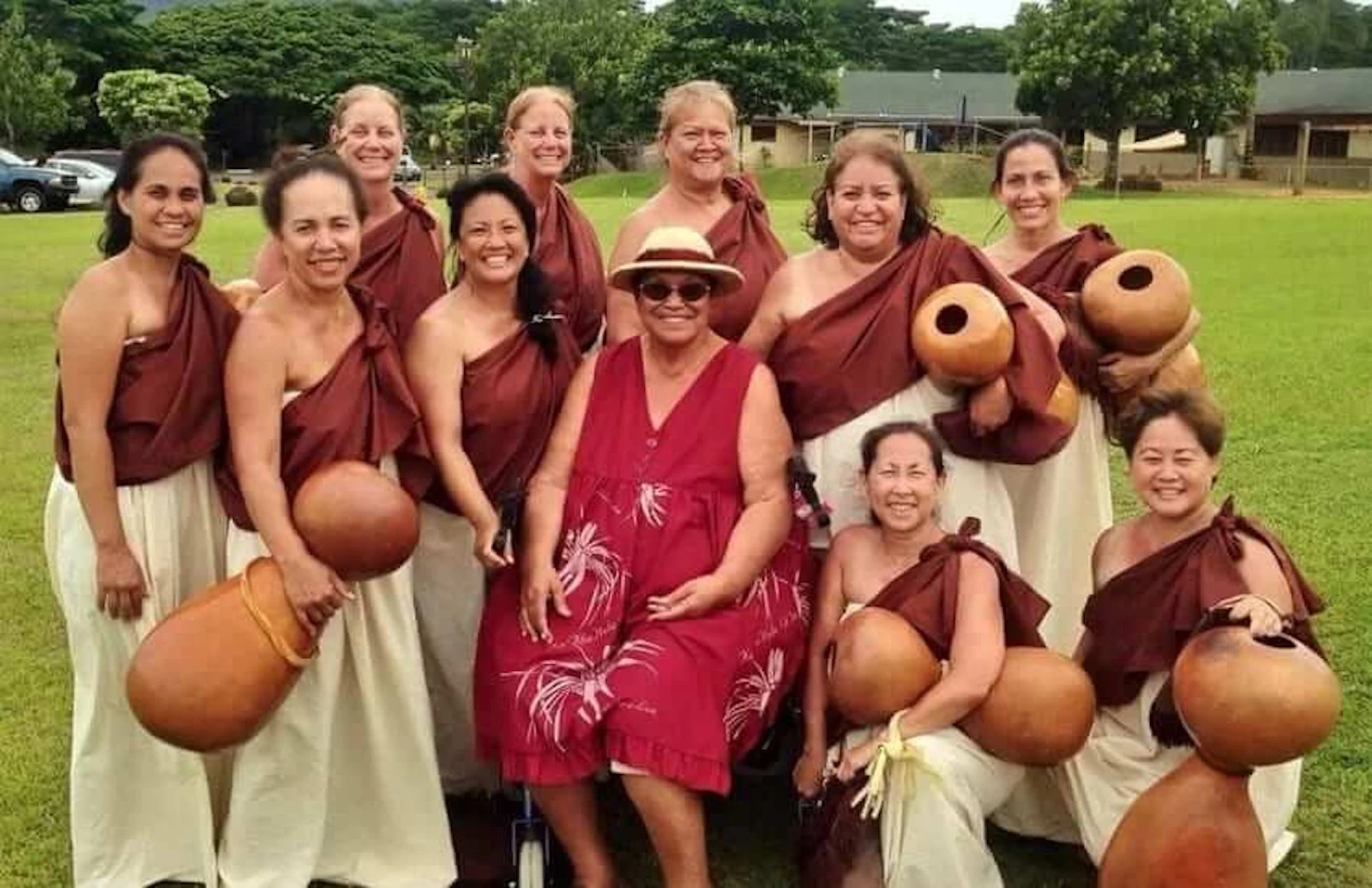 Kumu Hula Leināʻala Kalama Heine (center) with 10 of the 13 women who were part of her first ʻūniki class in 2009. The hālau celebrates its 50th birthday this year.