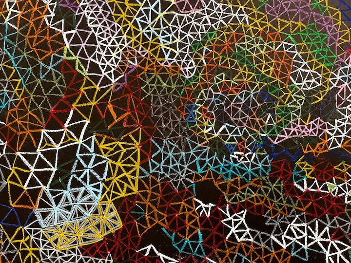 The design uses more than a dozen colors to represent life on the Islands.