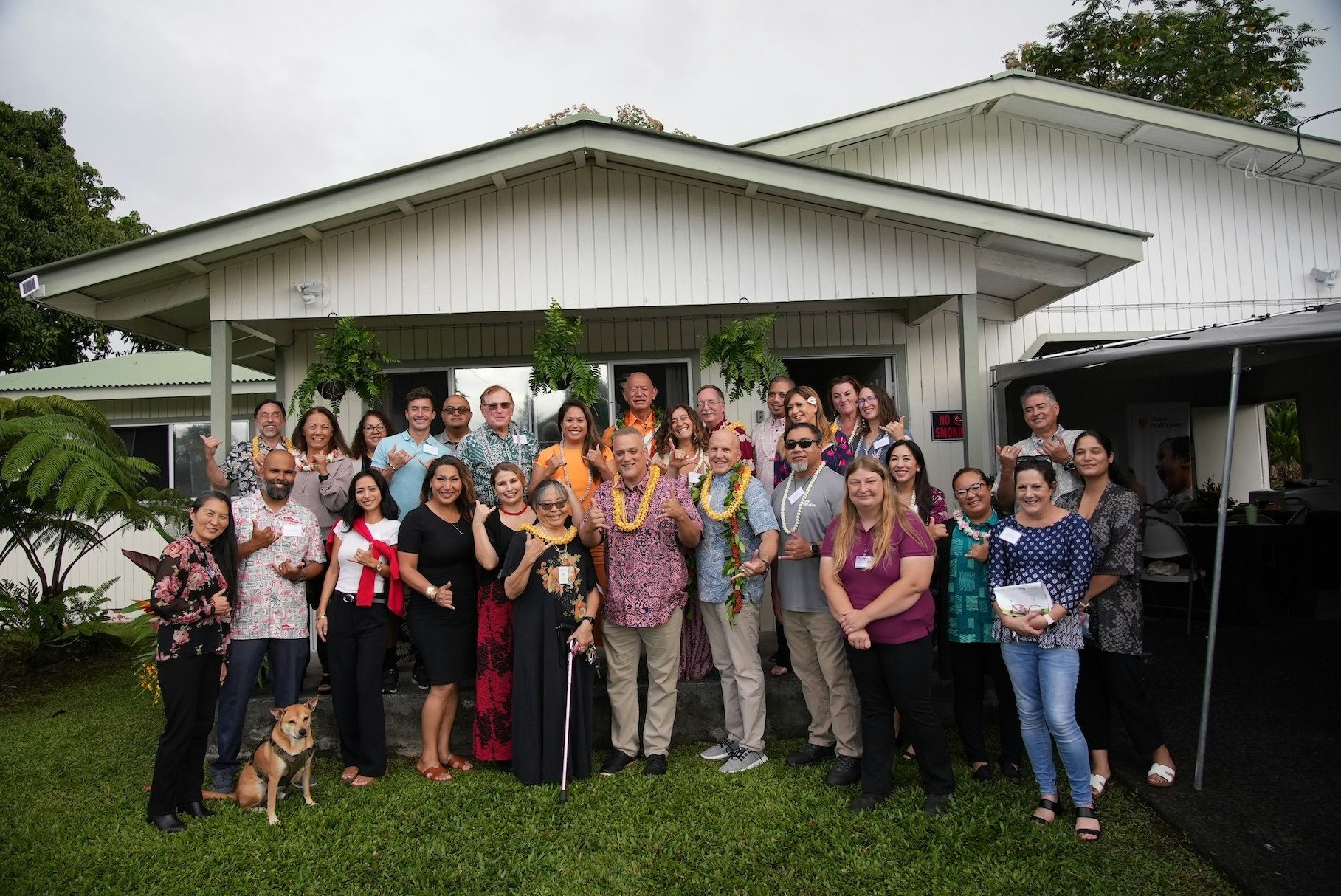 A group gathered in front of a new homlessness clinic in Hilo.