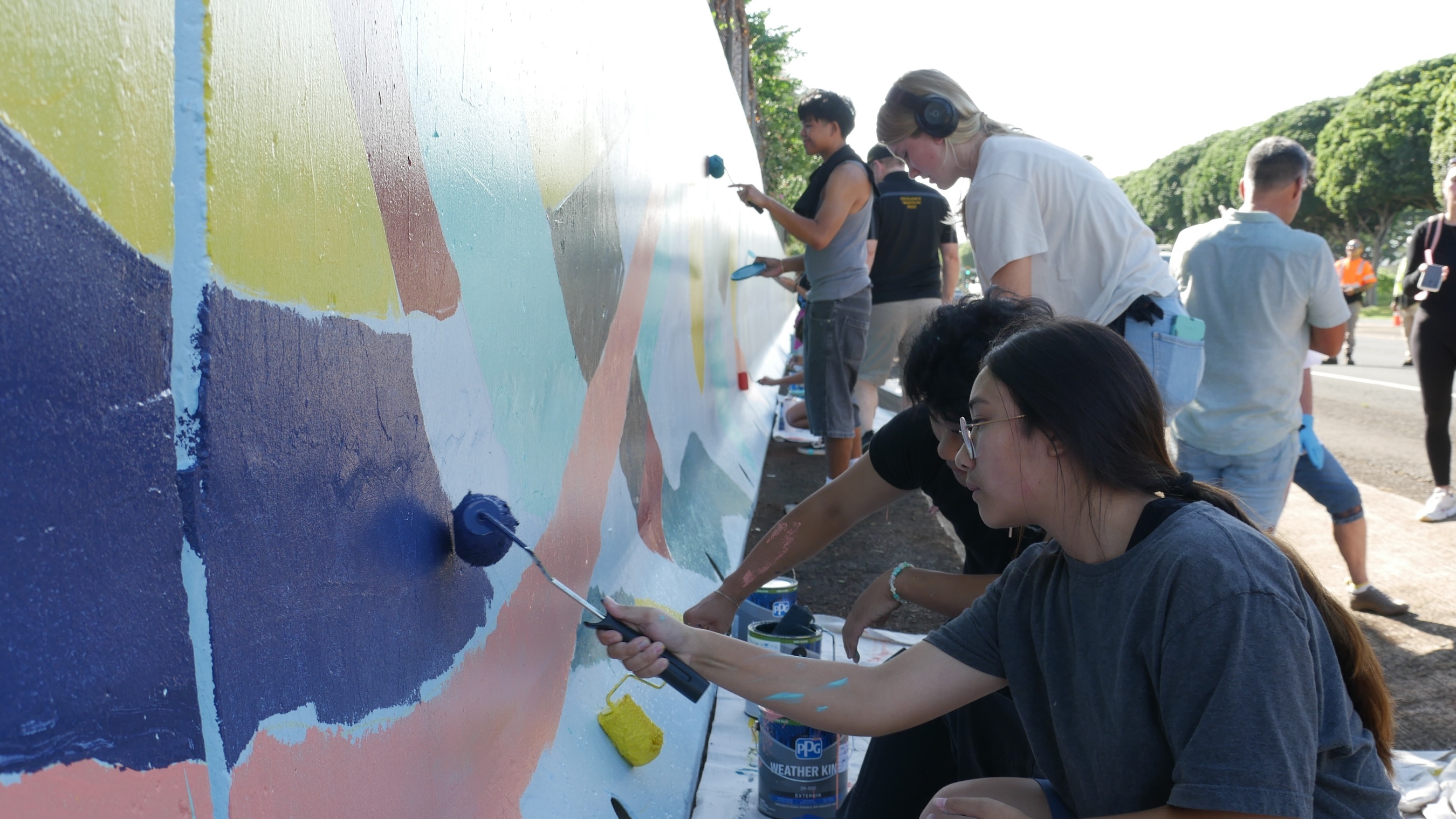 Students from three high schools each painted a section of a large mural along Kamehameha Highway in Waipio on Saturday, Oct. 25, and Sunday, Oct. 26.
