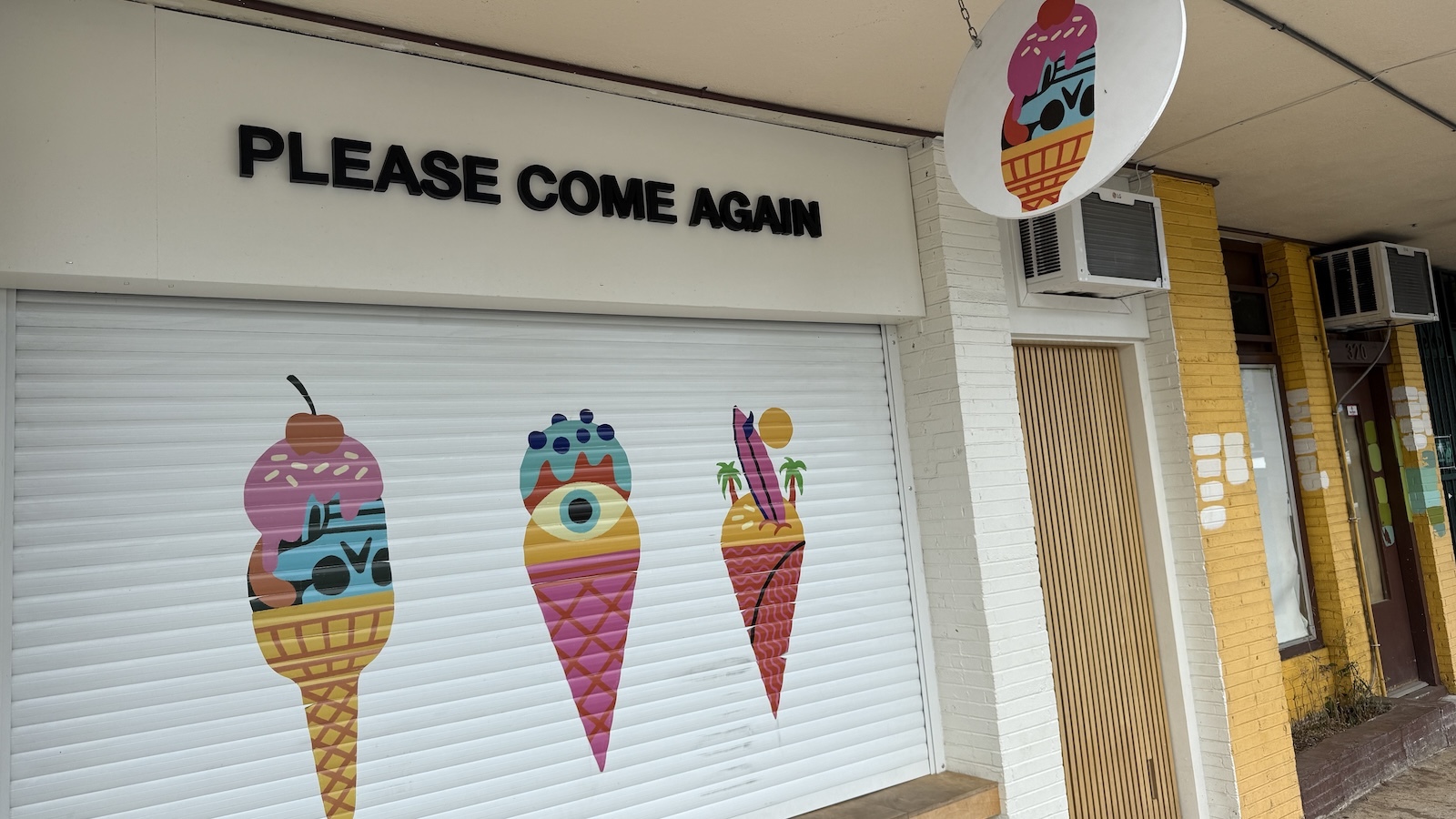 Please Come Again storefront