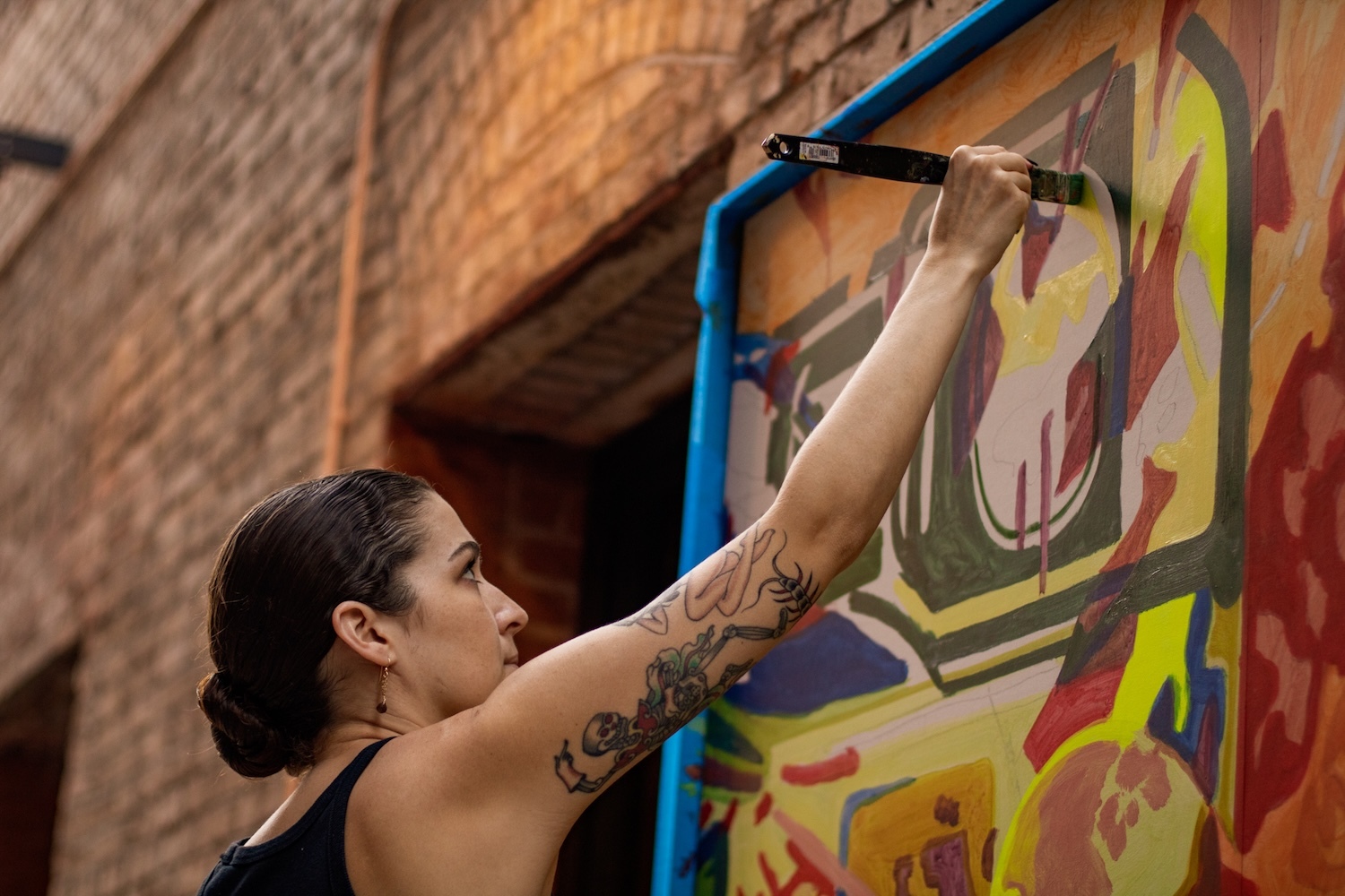 Sanoe Stevenson-Egeland is one of 11 artists who participated in a 500-foot mural that will be unveiled on the Garden Isle on Saturday, June 27. She grew up on Kauaʻi and now lives in Seattle.