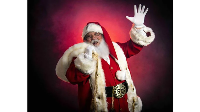 Steve Butler dressed as Santa, ready to spread the joy of the holiday season.