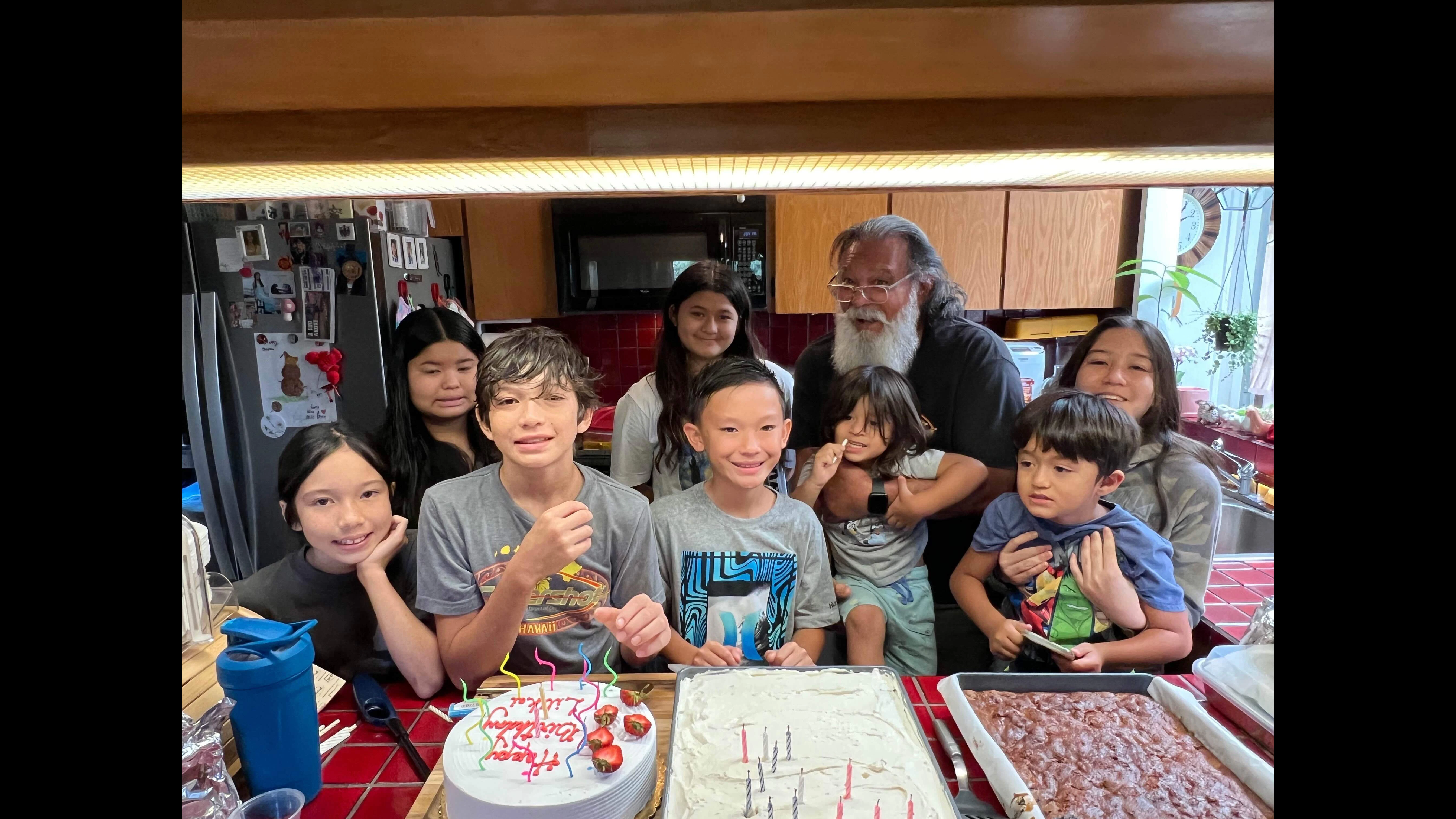 “Grampy” Steve Butler with his eight grandchildren. Another will arrive in July.