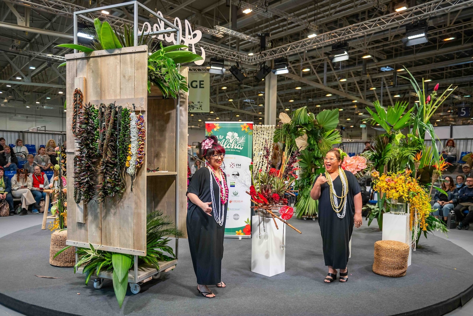 "Spirit of Aloha," the signature main-stage floral experience at IPM Essen 2026 in Germany, was co-designed by Brenna Quan of Canada, left, and Sue Tabbal-Yamaguchi, right, owner of SU-V Expressions in Kakaʻako.