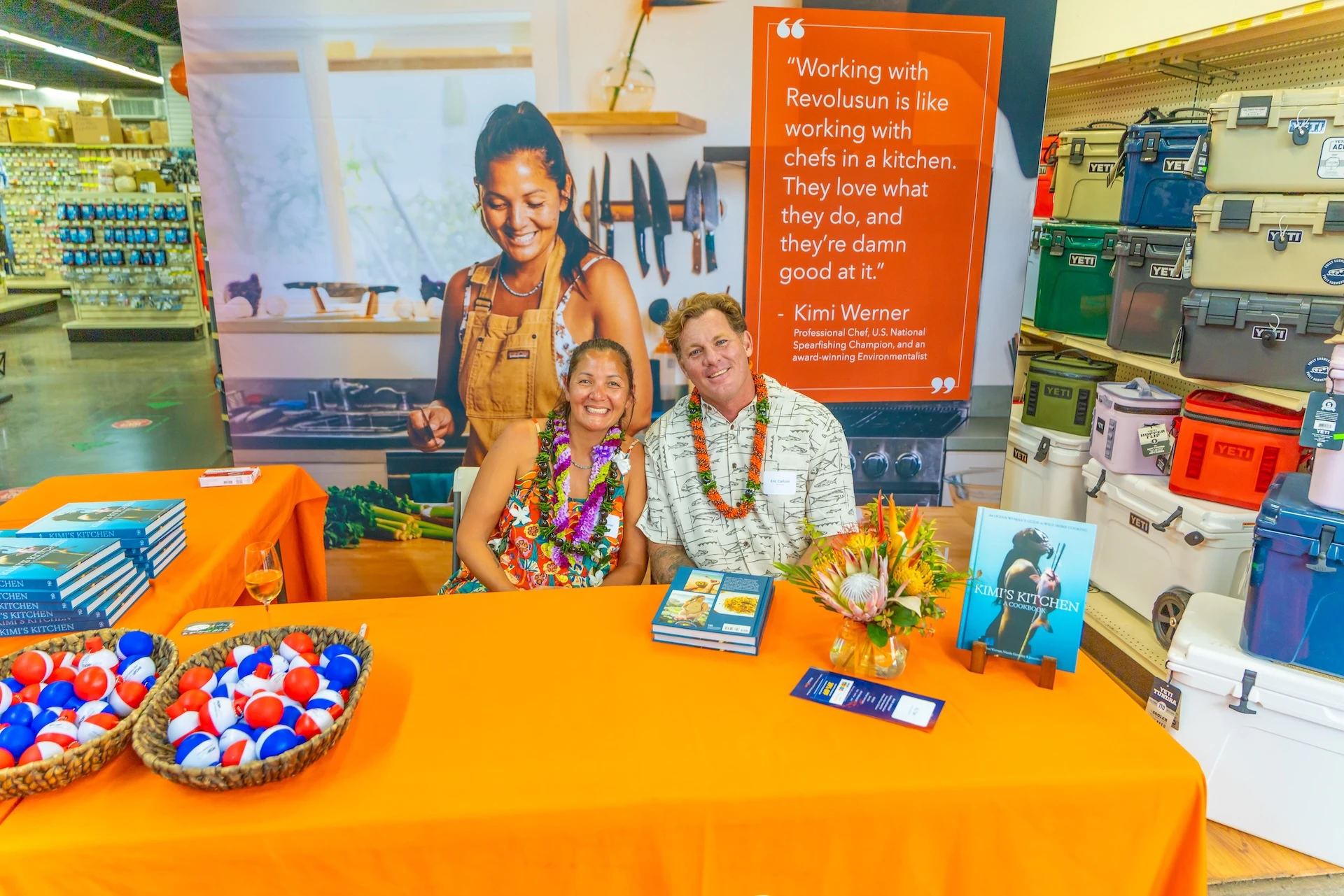New cookbook author Kimi Werner pictured with Eric Carlson, RevoluSun co-founder and chief innovation officer, at POP Fishing & Marine in Honolulu. Photo courtesy Courtesy Tommy Pierucki