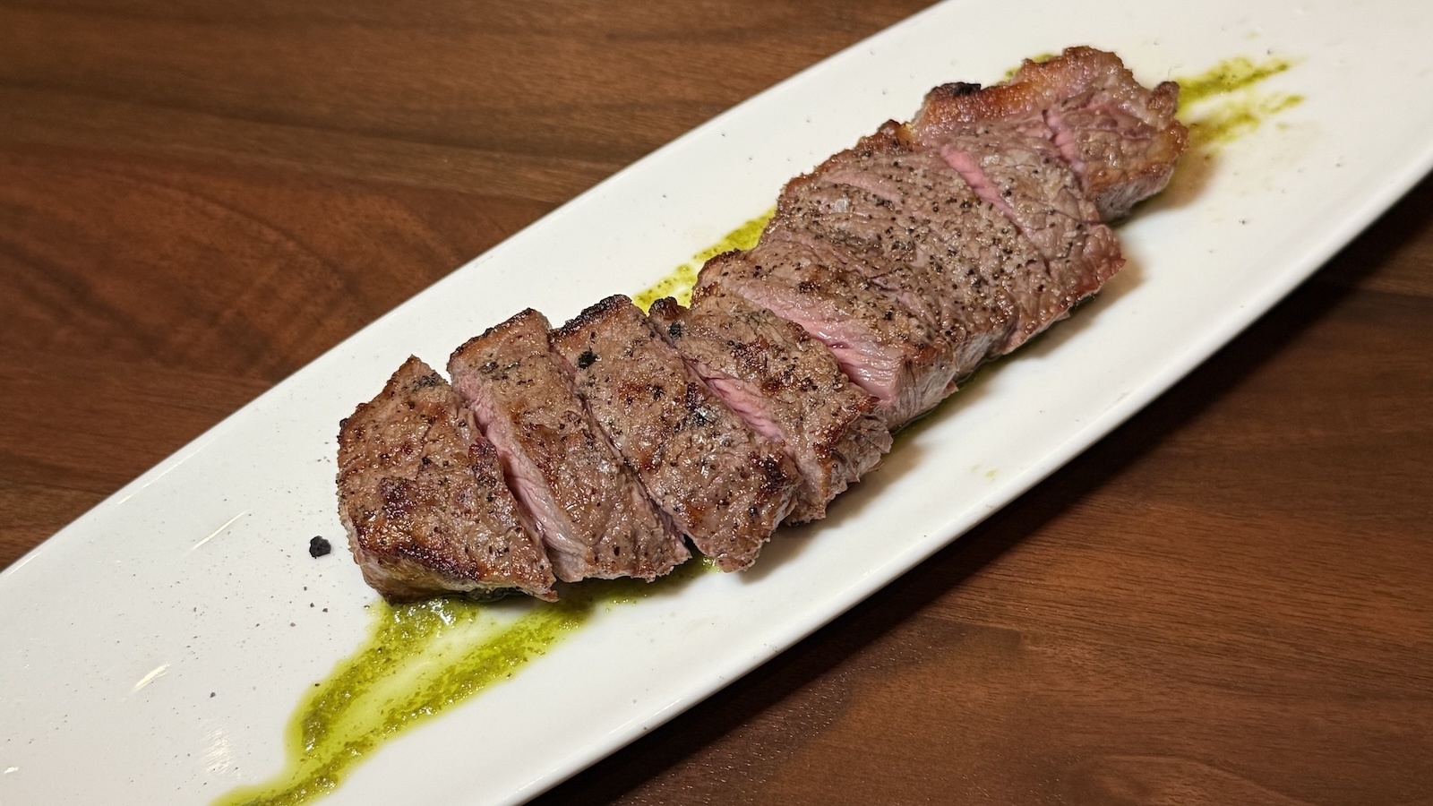 sliced dry-aged New York strip