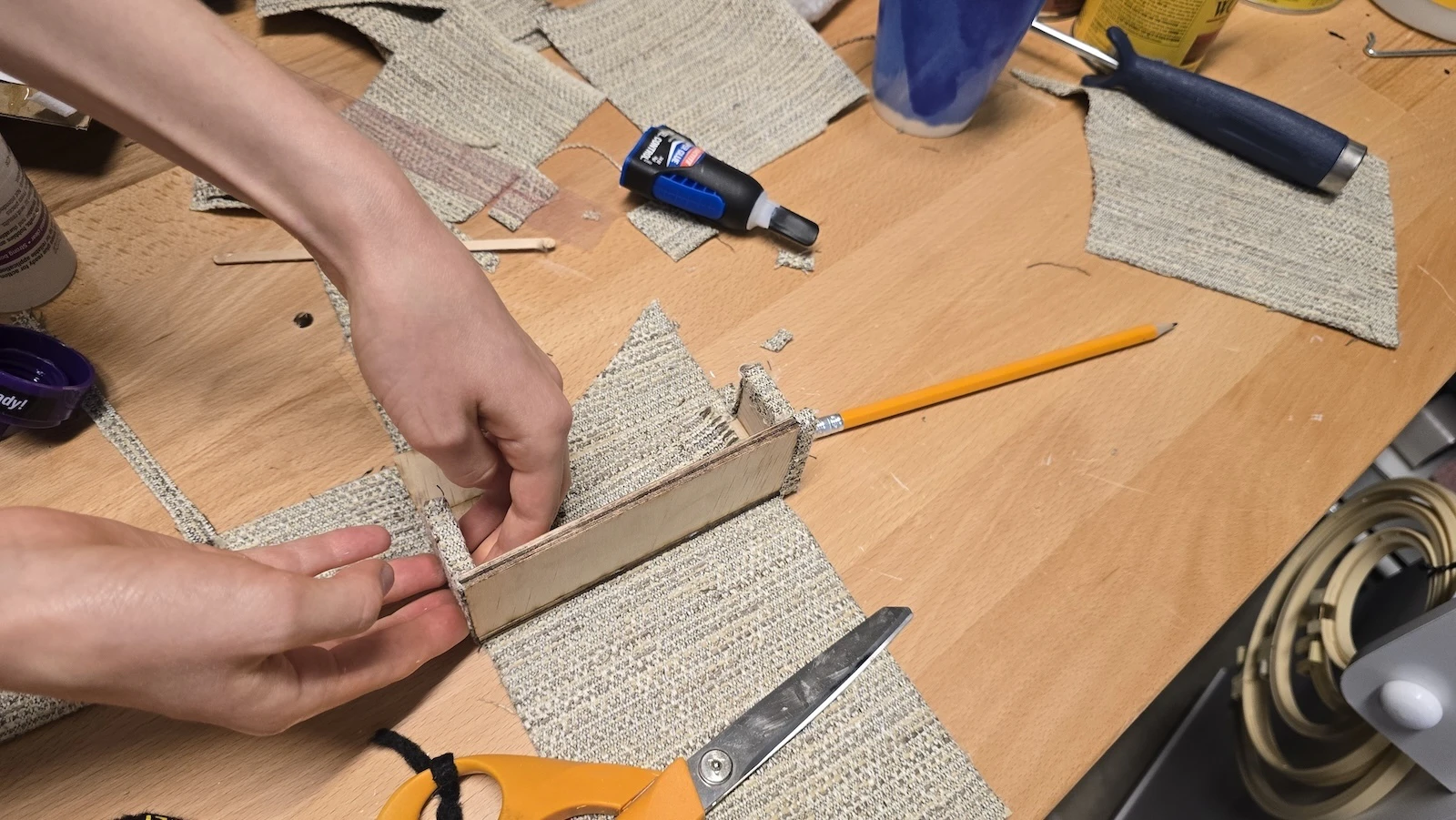 Mahealani Summerer, 12, works to construct miniature furniture for her business, which will be sold at The Future is Keiki Market on April 19.