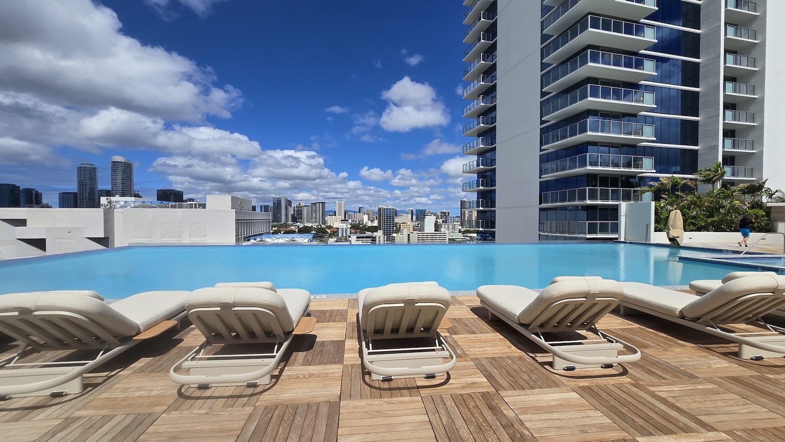 The pool has views of the city.