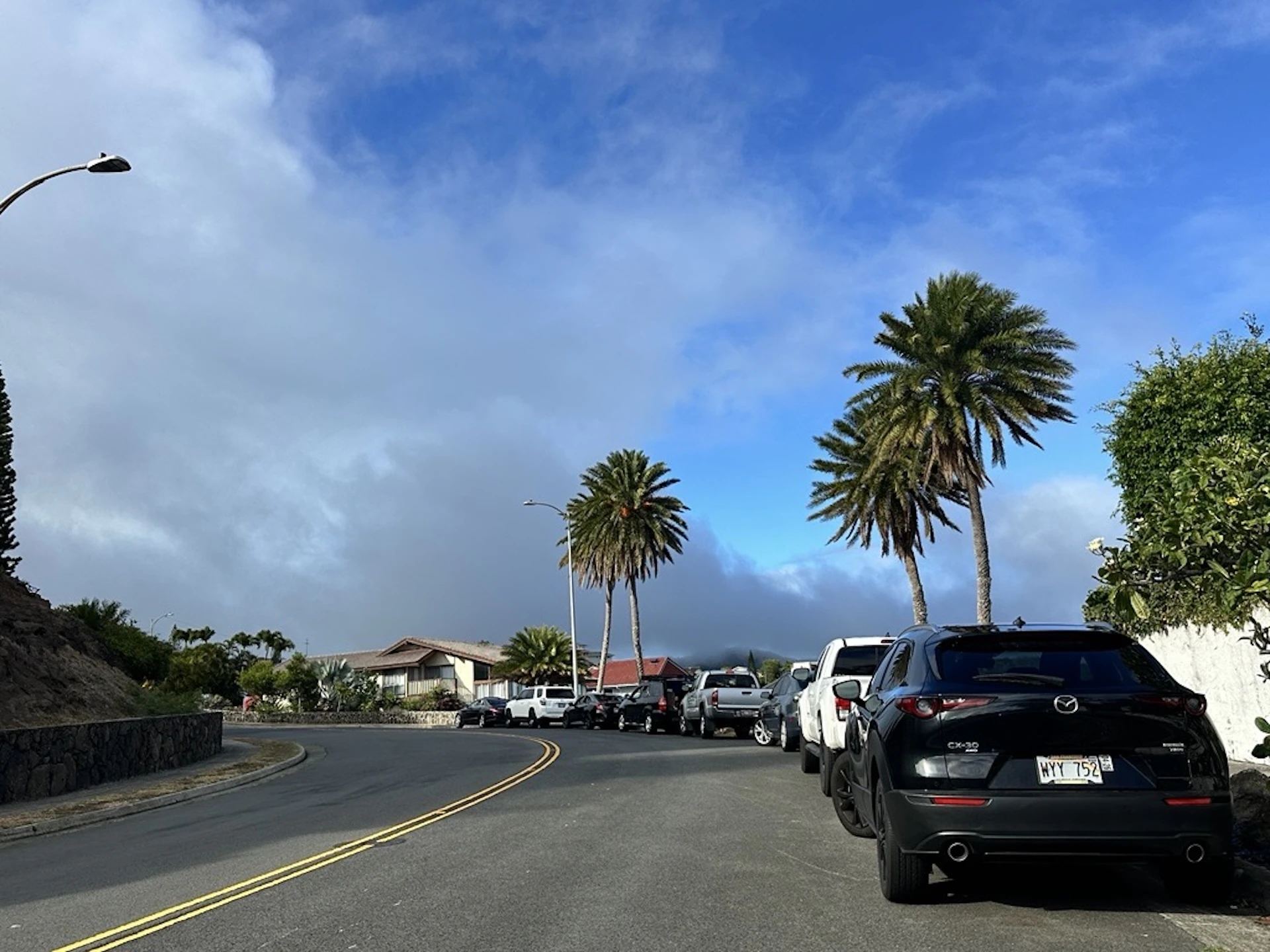 Cars lined up on Mariner’s Ridge where families are waiting out the tsunami at higher ground.