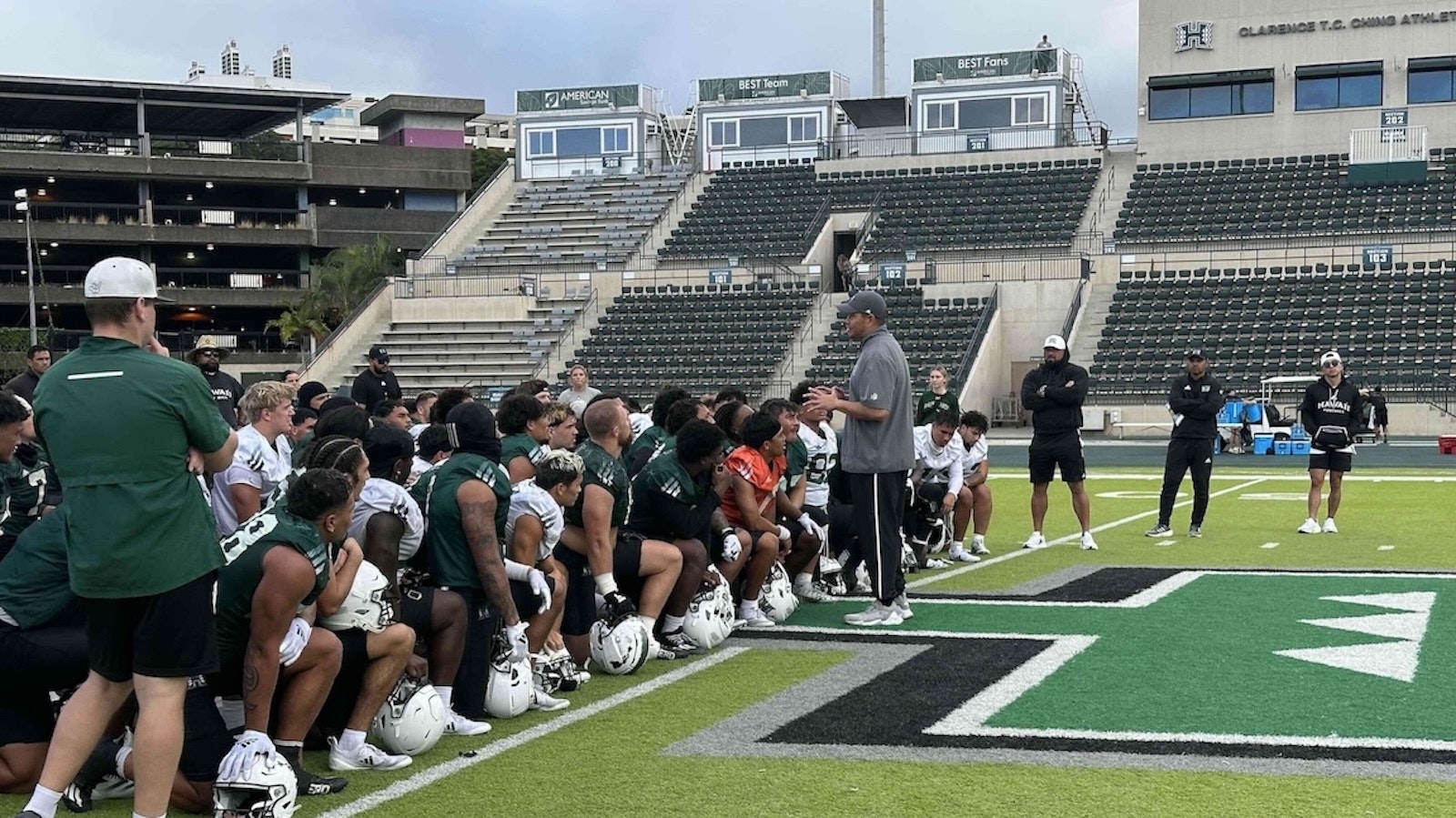 Football players practicing.