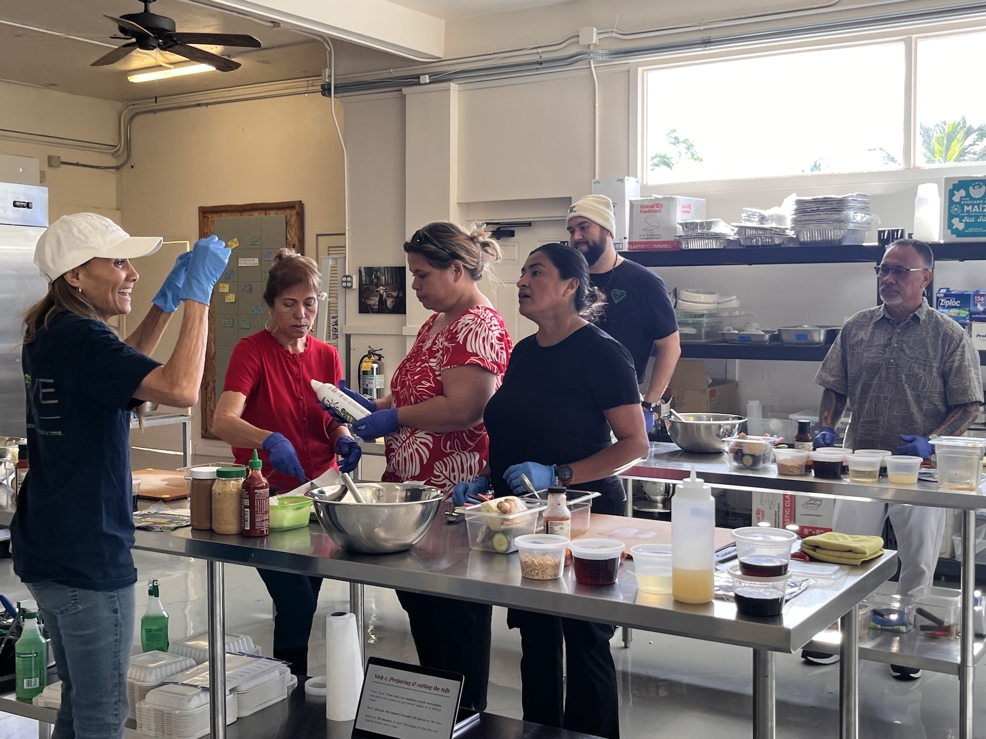 Smith, left, conducts a food demonstration at Waimānalo Health Center.