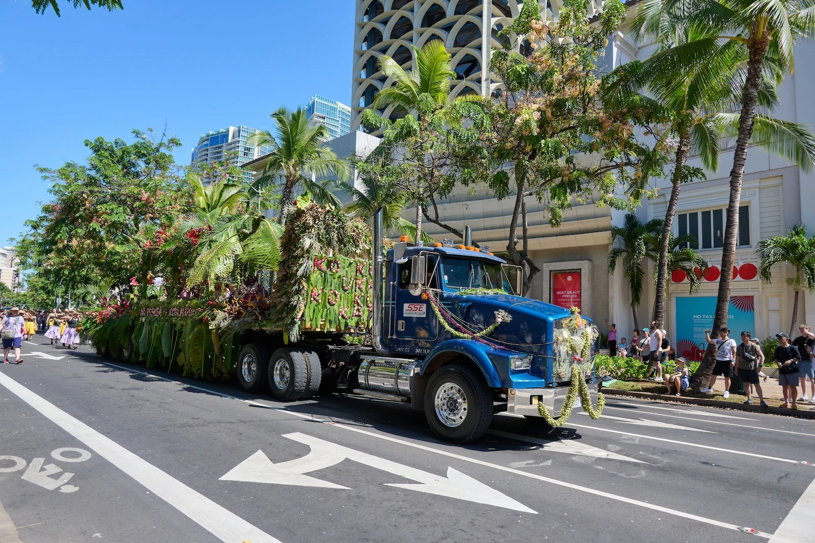 Nā Puakea o Koʻolaupoko’s float cruises down Kalākaua Avenue last year. It won first place in the parade’s float division.