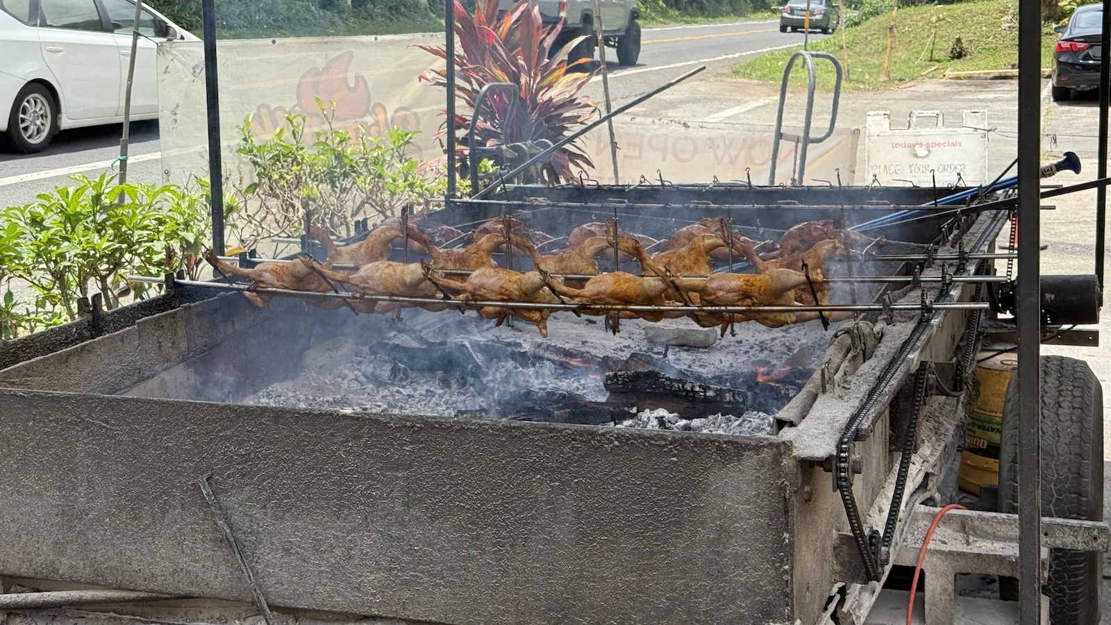 Huli huli chicken being grilled