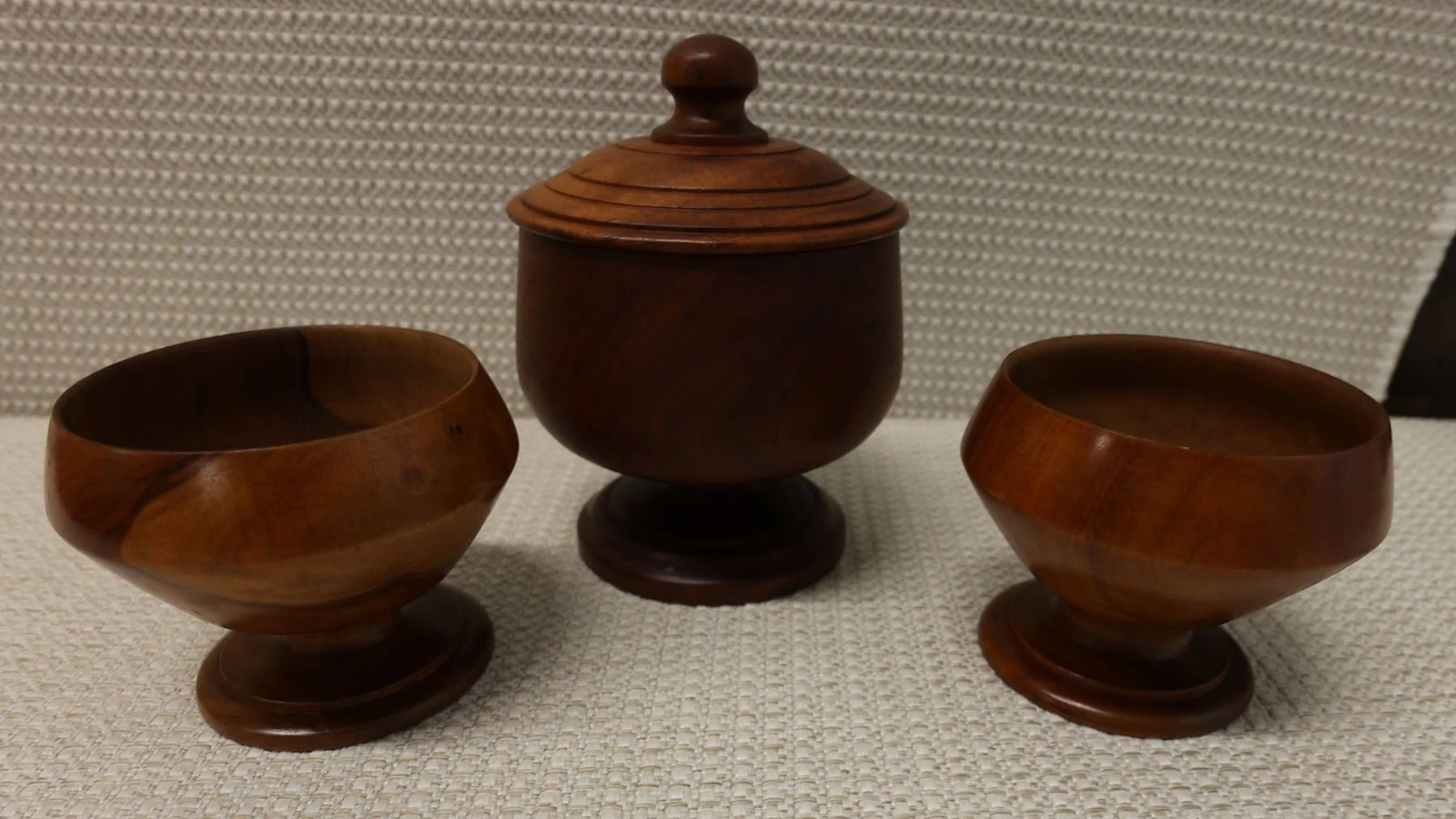 A set of three turned koa wood umeke bowls.