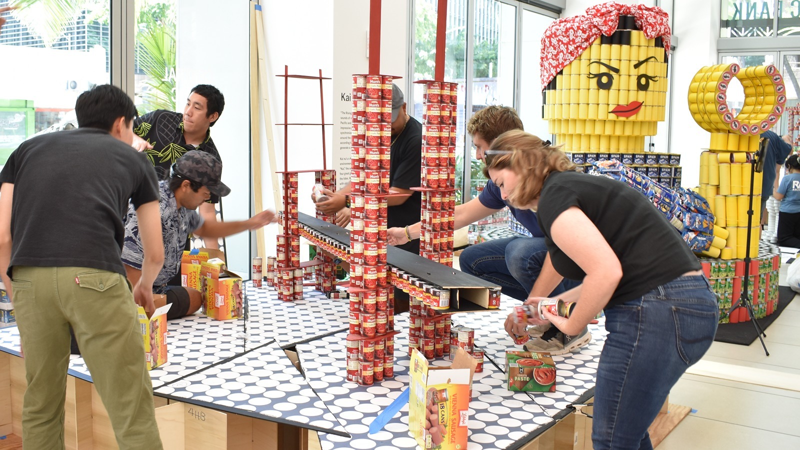 Teams worked Saturday, Sept. 12, to construct sculptures out of cans for AIA Honolulu's annual CANstruction competition.