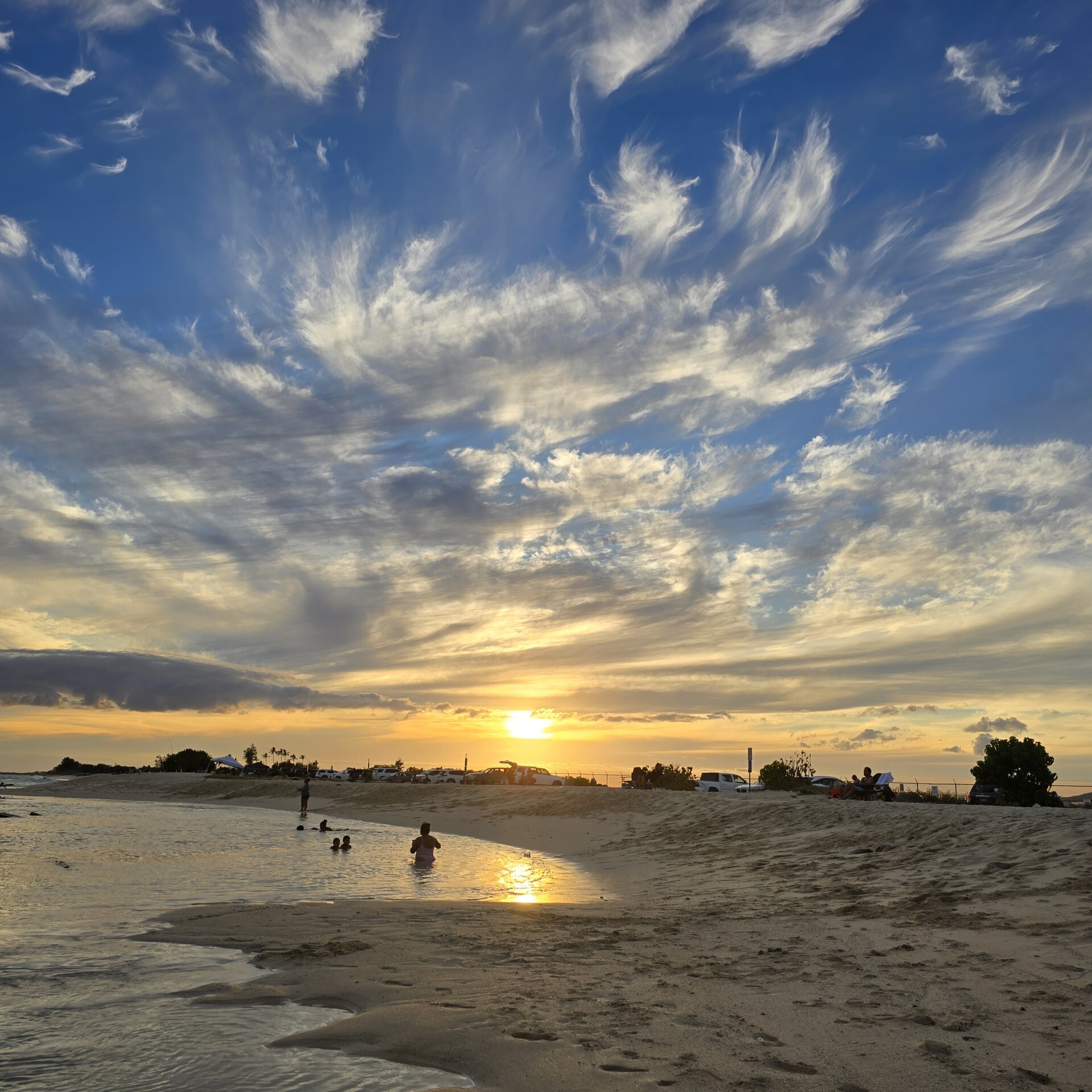 Wispy clouds in the sky.