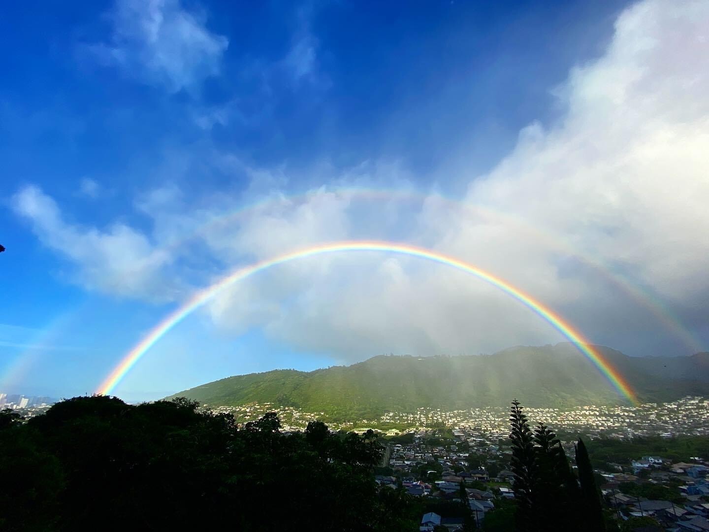 A double rainbow across the sky