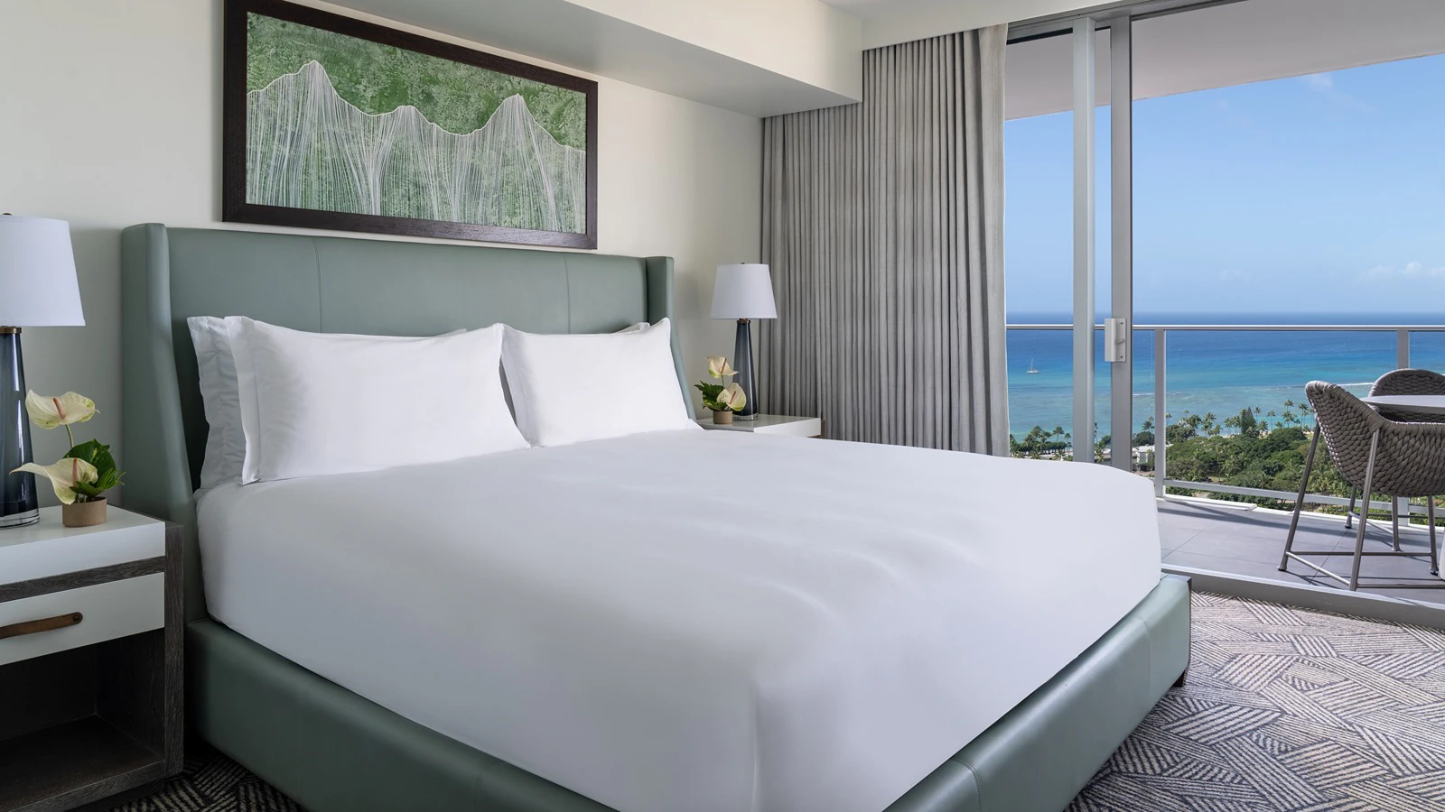 The bedroom of a Grand Level ocean view suite at The Ritz-Carlton Residences, Waikiki Beach.