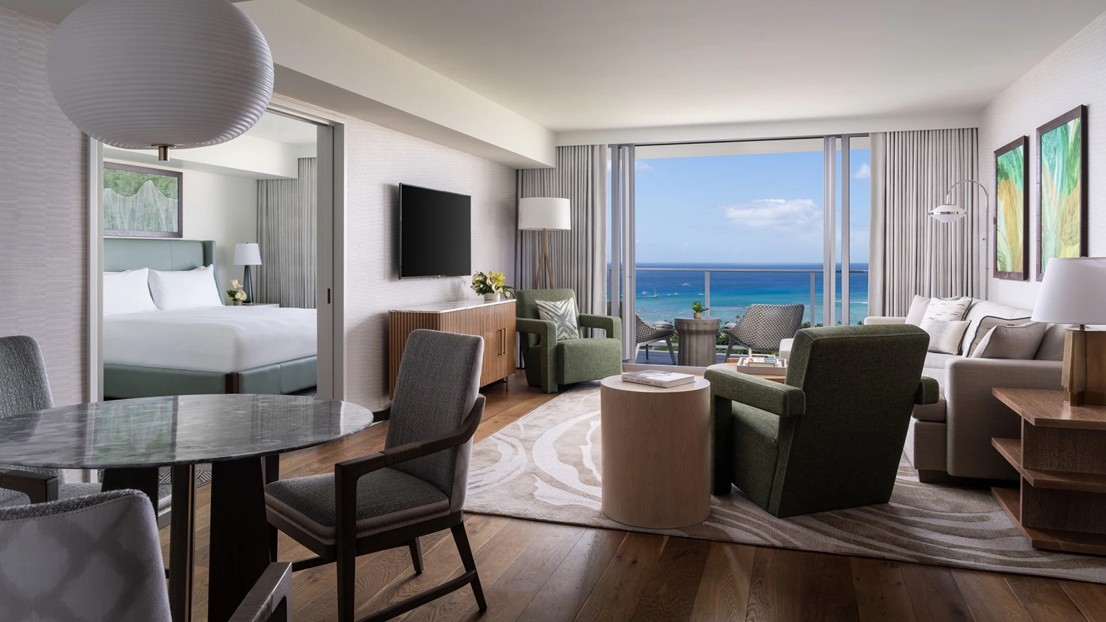 The Ritz-Carlton Residences, Waikiki Beach, a 552-room luxury hotel that opened in 2016, has refreshed the guest rooms in its ‘Ewa Tower, front desk and both infinity pools, in an $82 million renovation. The living room of a Grand Level suite is pictured here.