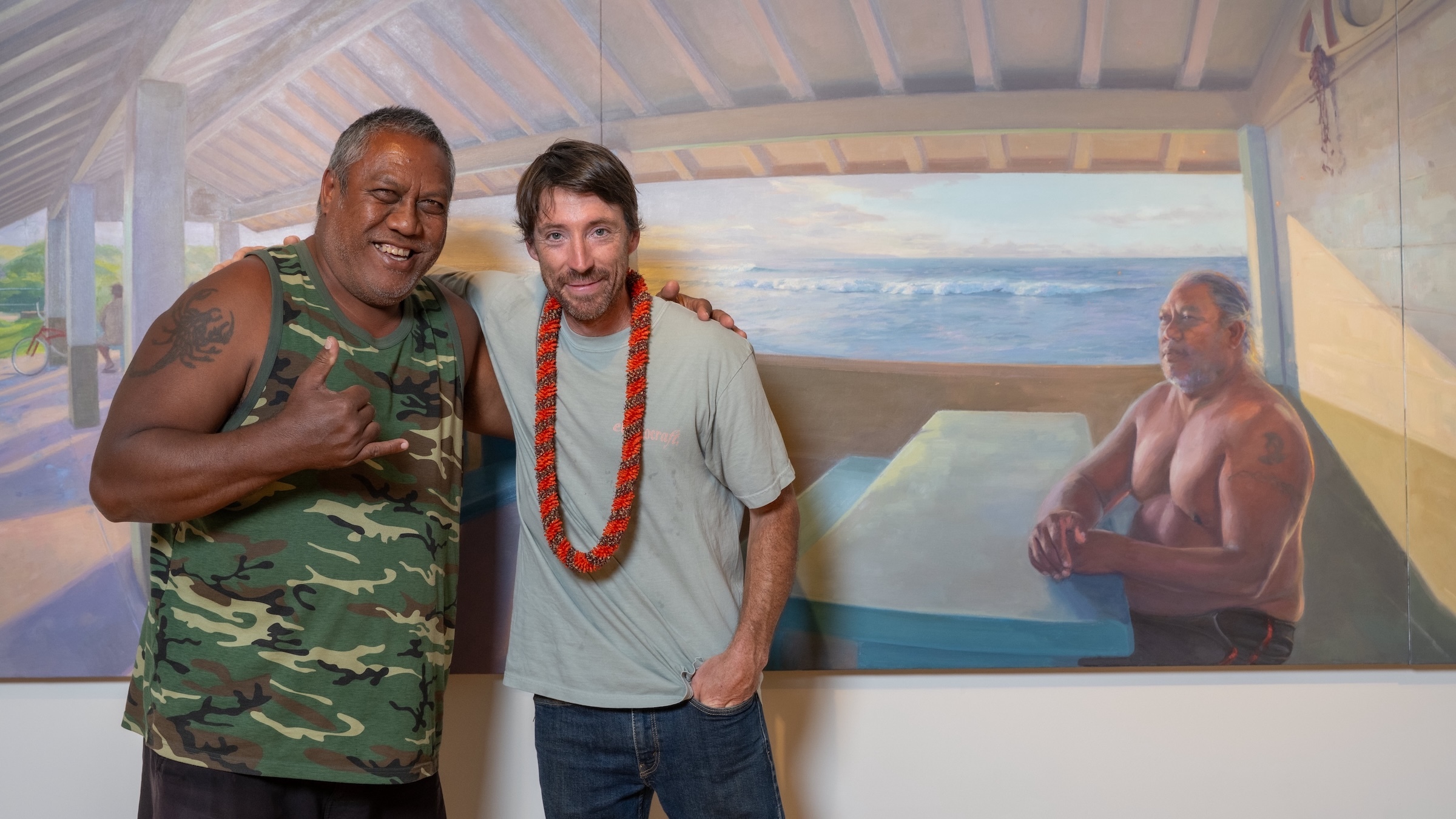 The Schaefer Portrait Challenge is visiting Capitol Modern, the Hawaiʻi State Art Museum, through July. This work of art depicts portrait subject John Kalei Matthew Ho'opai, left, and was created by artist Damian Smith, right.