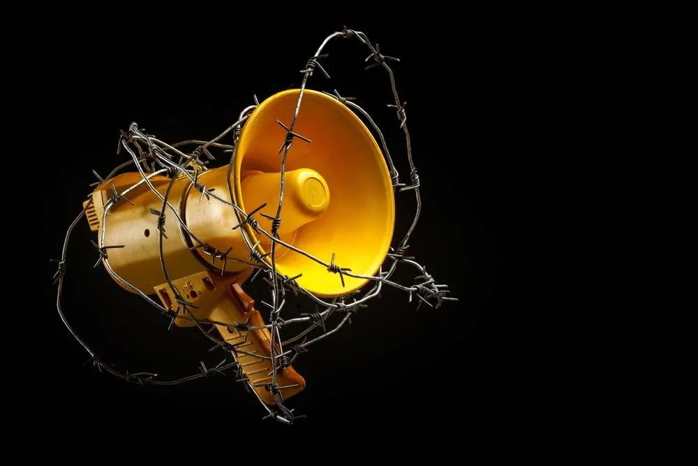 Megaphone with barbed wire -- Act 11