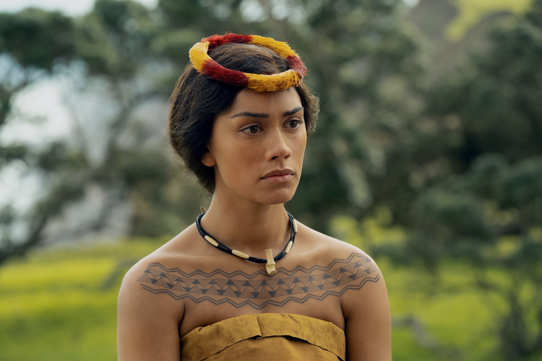 Ka’ahumanu, played by actress Luciane Buchanan, wears a feather lei created by Kumu Hula Nui Rick San Nicolas in “Chief of War.”