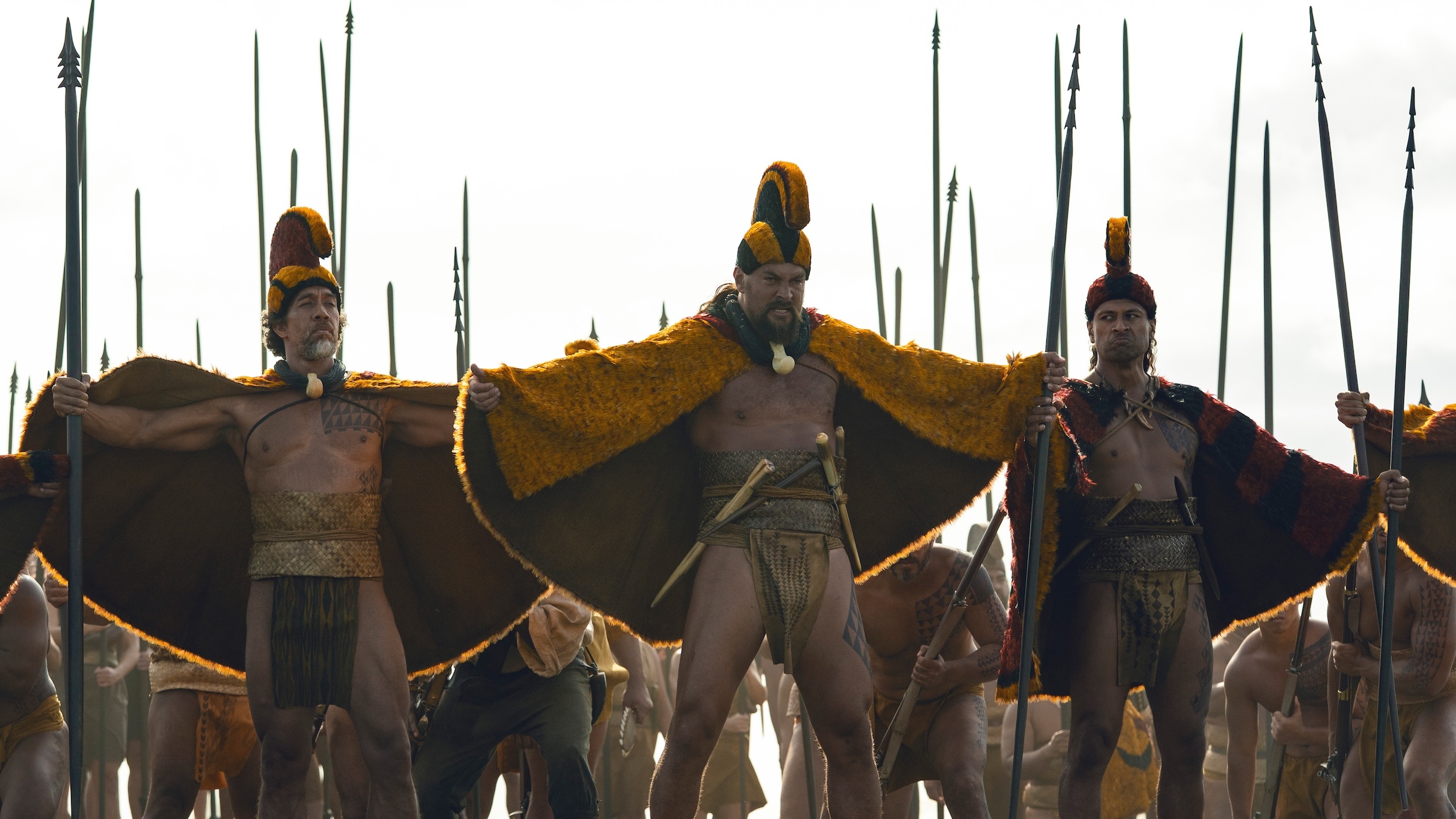 Actors Moses Goods, Jason Momoa and Te Kohe Tuhaka star in "Chief of War," which is now streaming on Apple TV.
