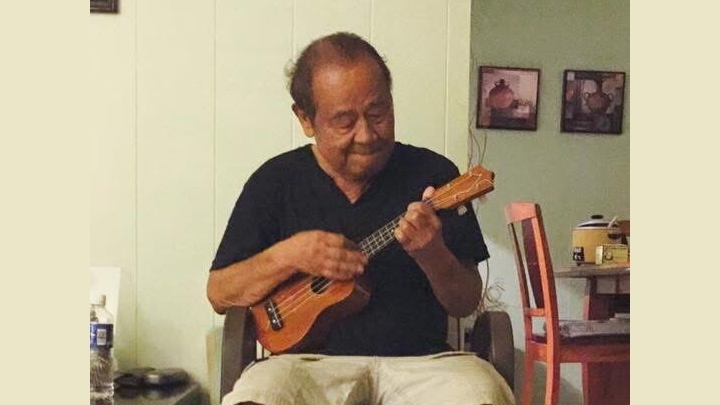 Dad playing ʻukulele