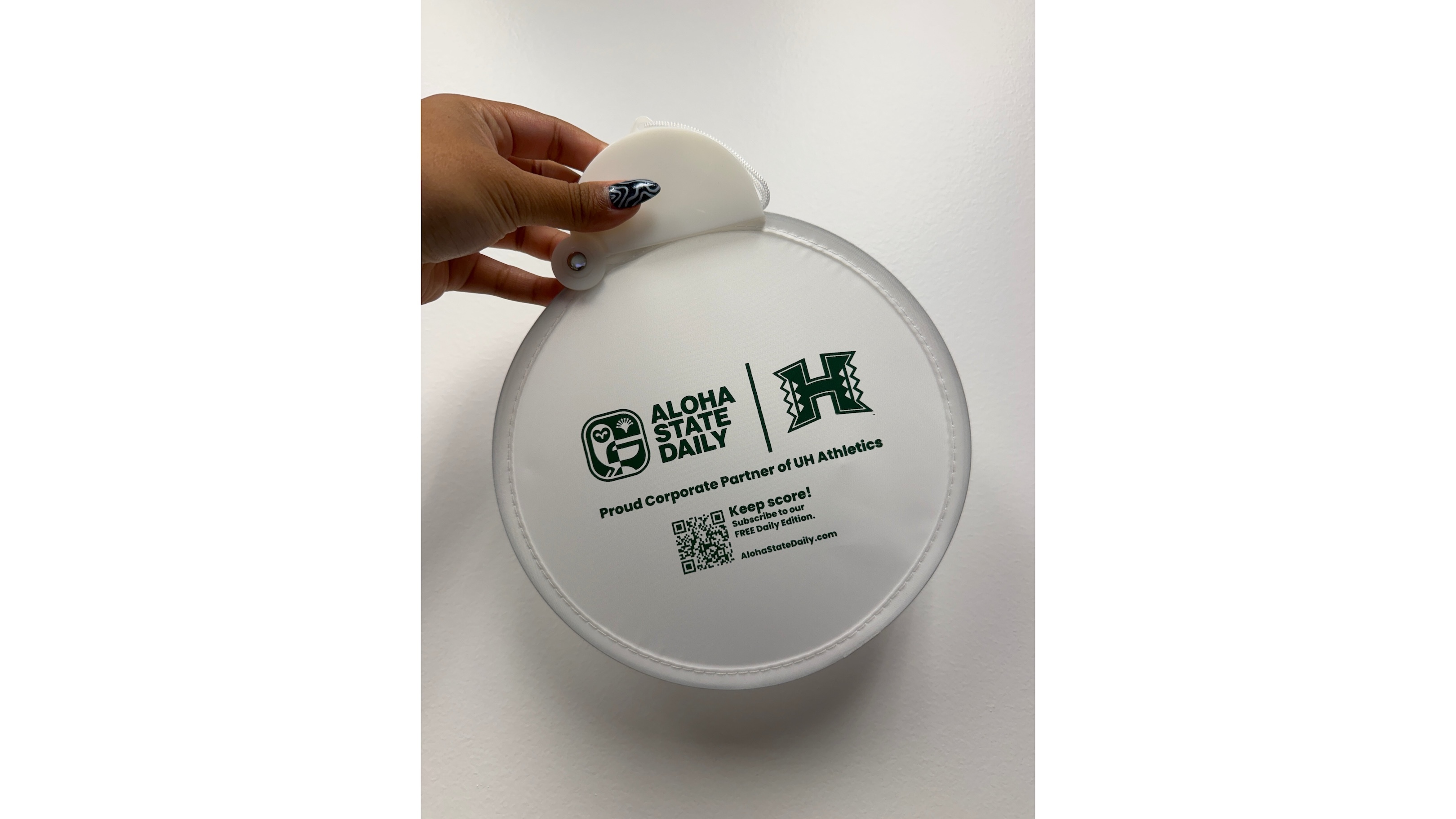 Stop by the Aloha State Daily booth to get a fan.
