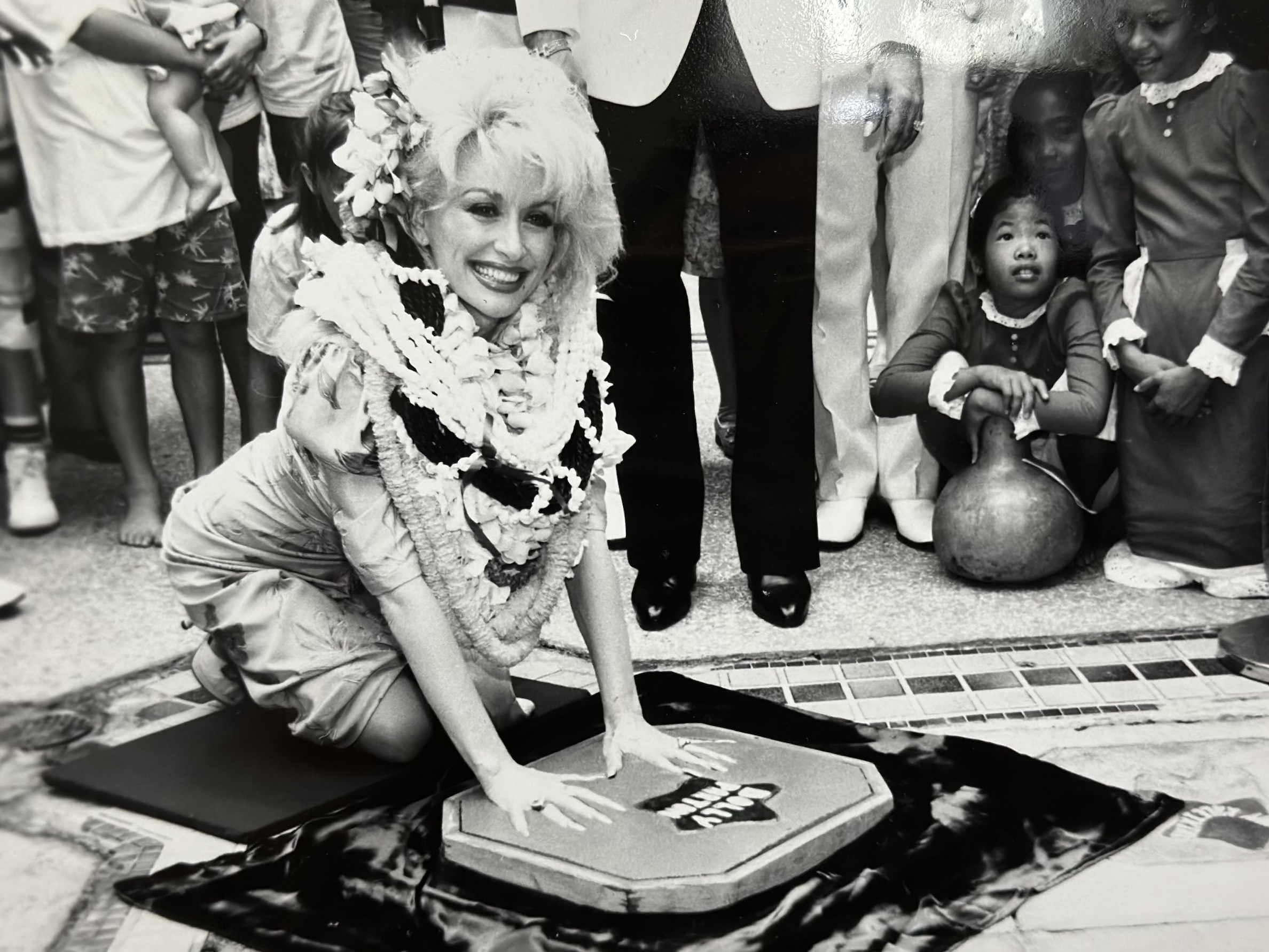 The Variety Club held a "Salute to Dolly Parton" on Oct. 4, 1987, where the singer and songwriter placed her handprints in the cement alongside previous honorees including Don Ho, Jim Narbors, Danny Kaleikini and more.
