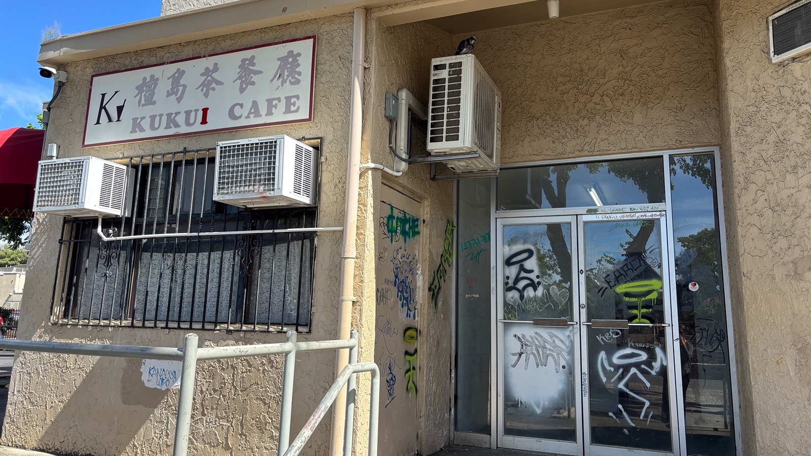 Graffiti is scrawled on the side of the Chinatown Cultural Plaza outside the Kukui Cafe on Thursday, Sept. 24, 2026.