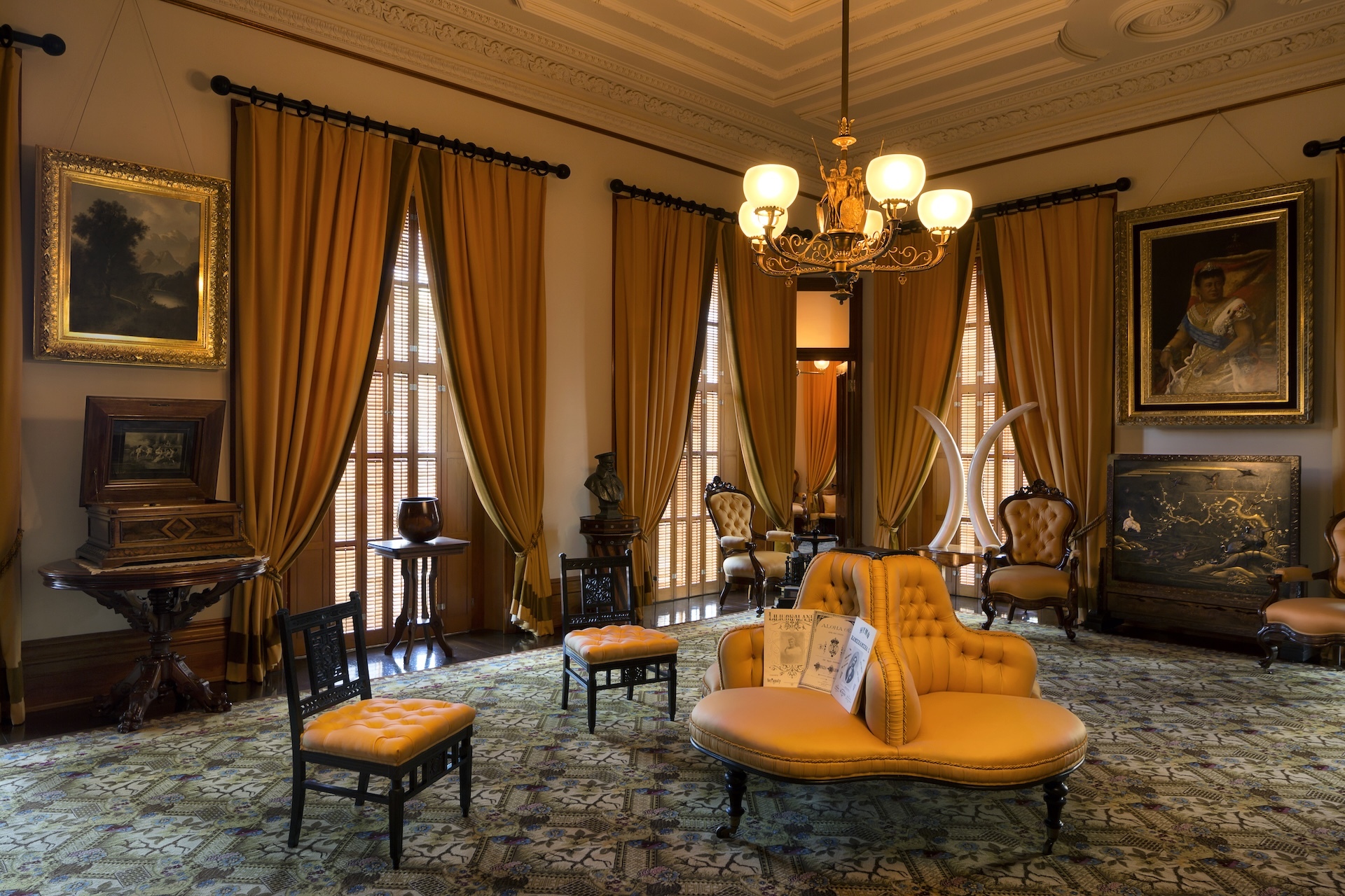 Among the original artifacts in the Gold Room is the table with the calabash by the window on the left side of this photo. It was found in the Iowa governor’s residence in 1973 and returned to the palace.