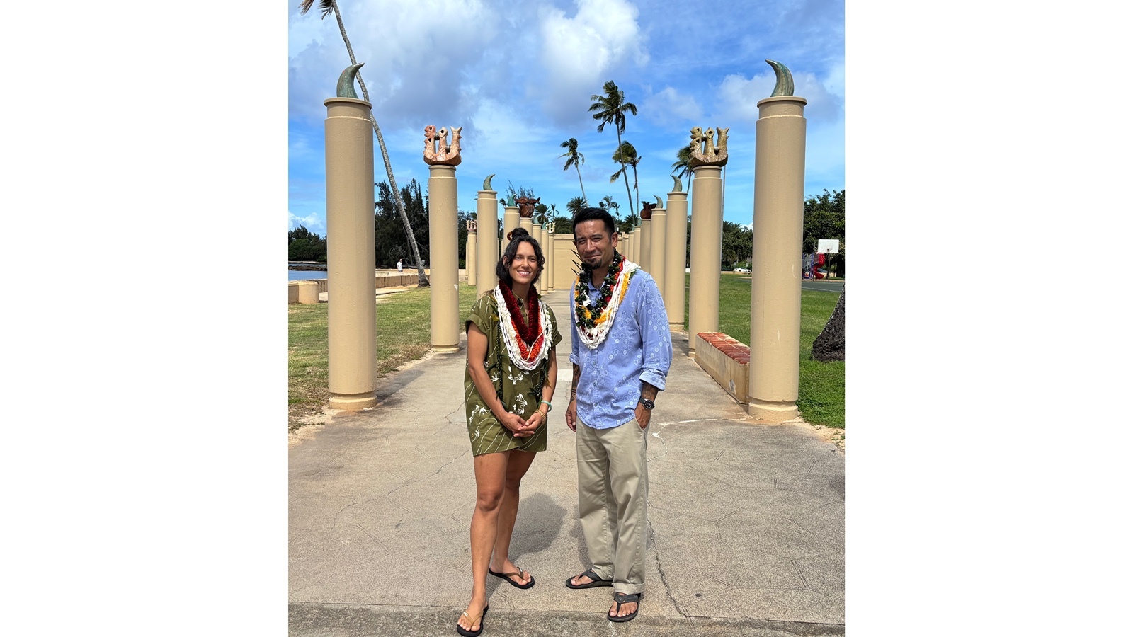 The City and County of Honolulu Mayor's Office of Culture and the Arts opened the final Wahi Pana art installation site at Haleʻiwa Beach Park on Friday morning. Artists Amber Khan and Jordan Souza stand in front of the completed carvings.