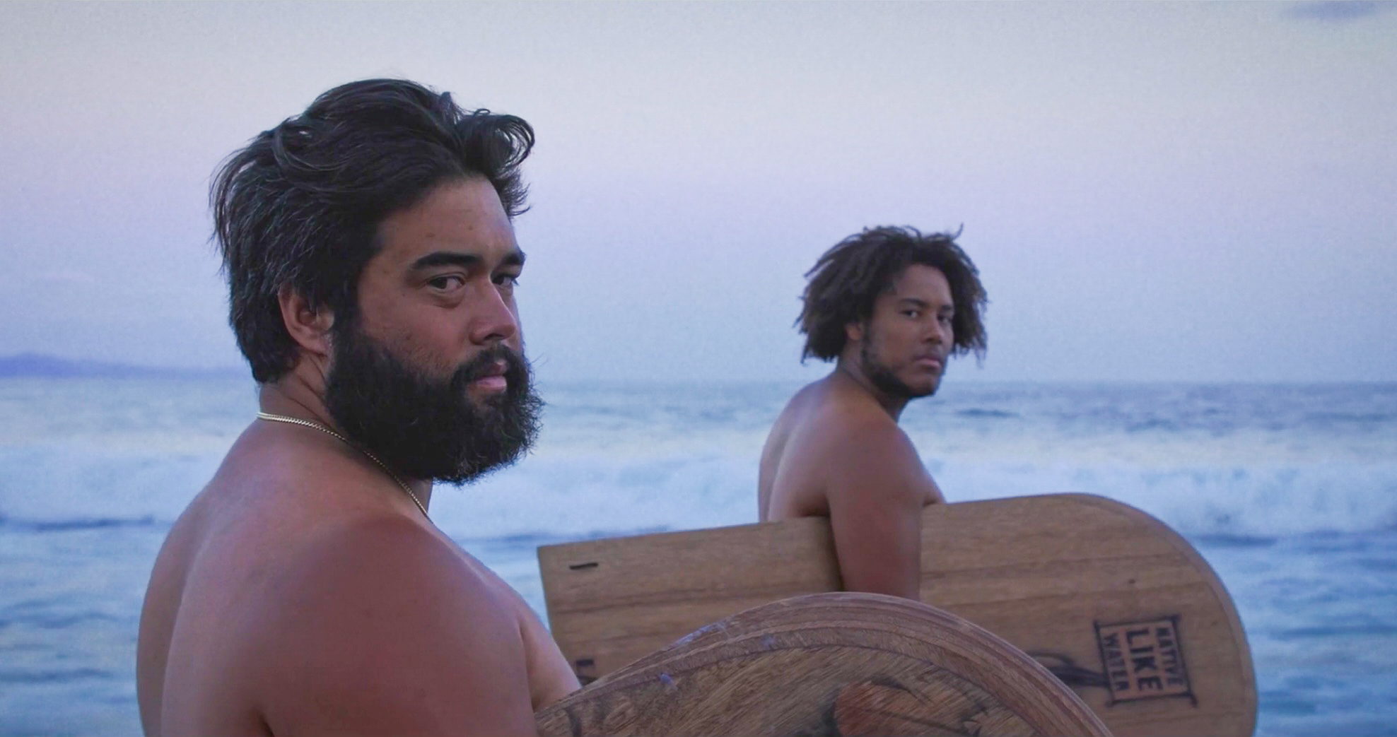 Kaliko Kahoonei, left, and Amon Braveheart Chavez, right, appear in the film “Haagua.”