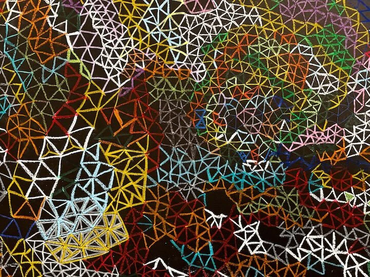 The design uses more than a dozen colors to represent life on the Islands.