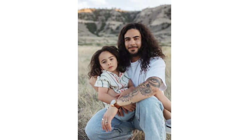Tim Kamanā and his son, Cannon.