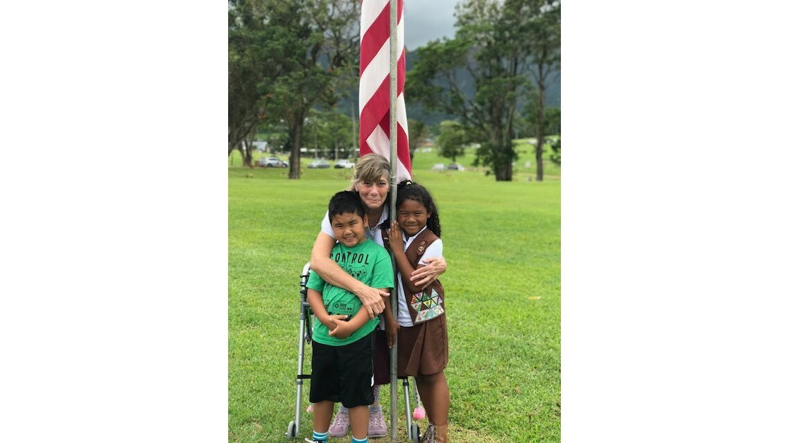 Maggie Hirakawa, center, started volunteering with Lei of Aloha at least 10 years ago when her granddaughter, Aiko Hernandez, right, was a Brownie. Her grandson, Caleb Hirakawa-Totor, is pictured left.