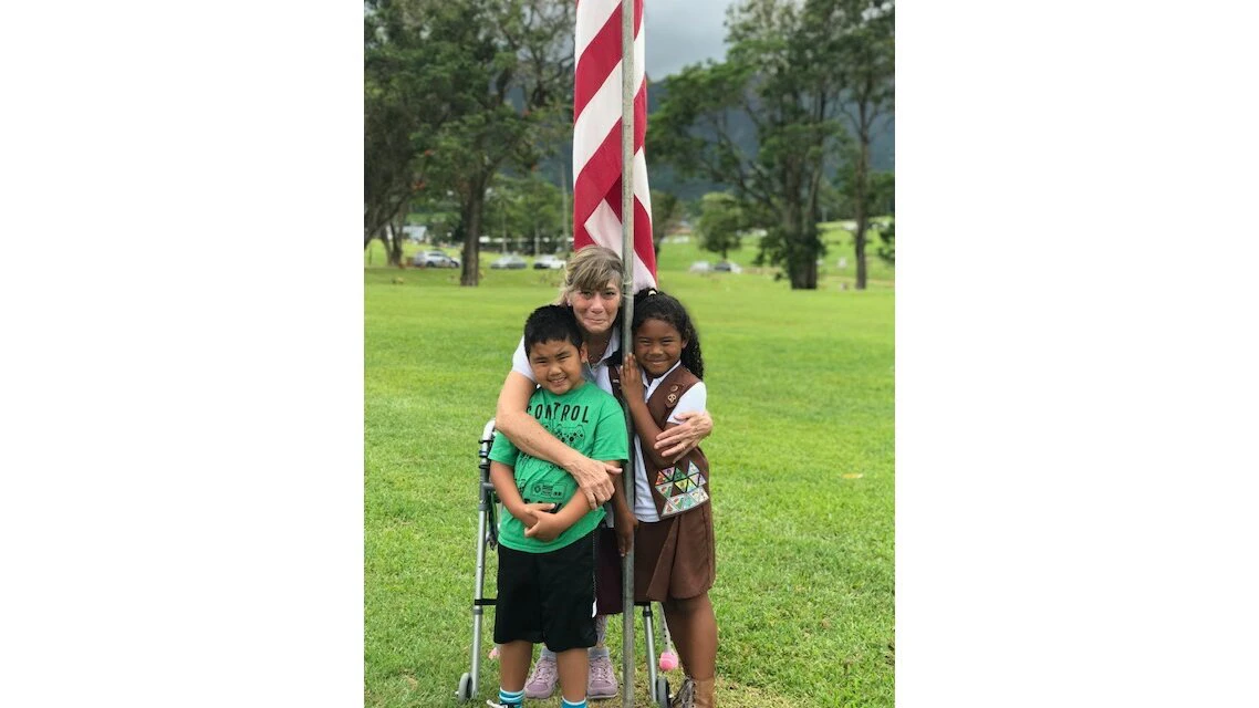Maggie Hirakawa, center, started volunteering with Lei of Aloha at least 10 years ago when her granddaughter, Aiko Hernandez, right, was a Brownie. Her grandson, Caleb Hirakawa-Totor, is pictured left.