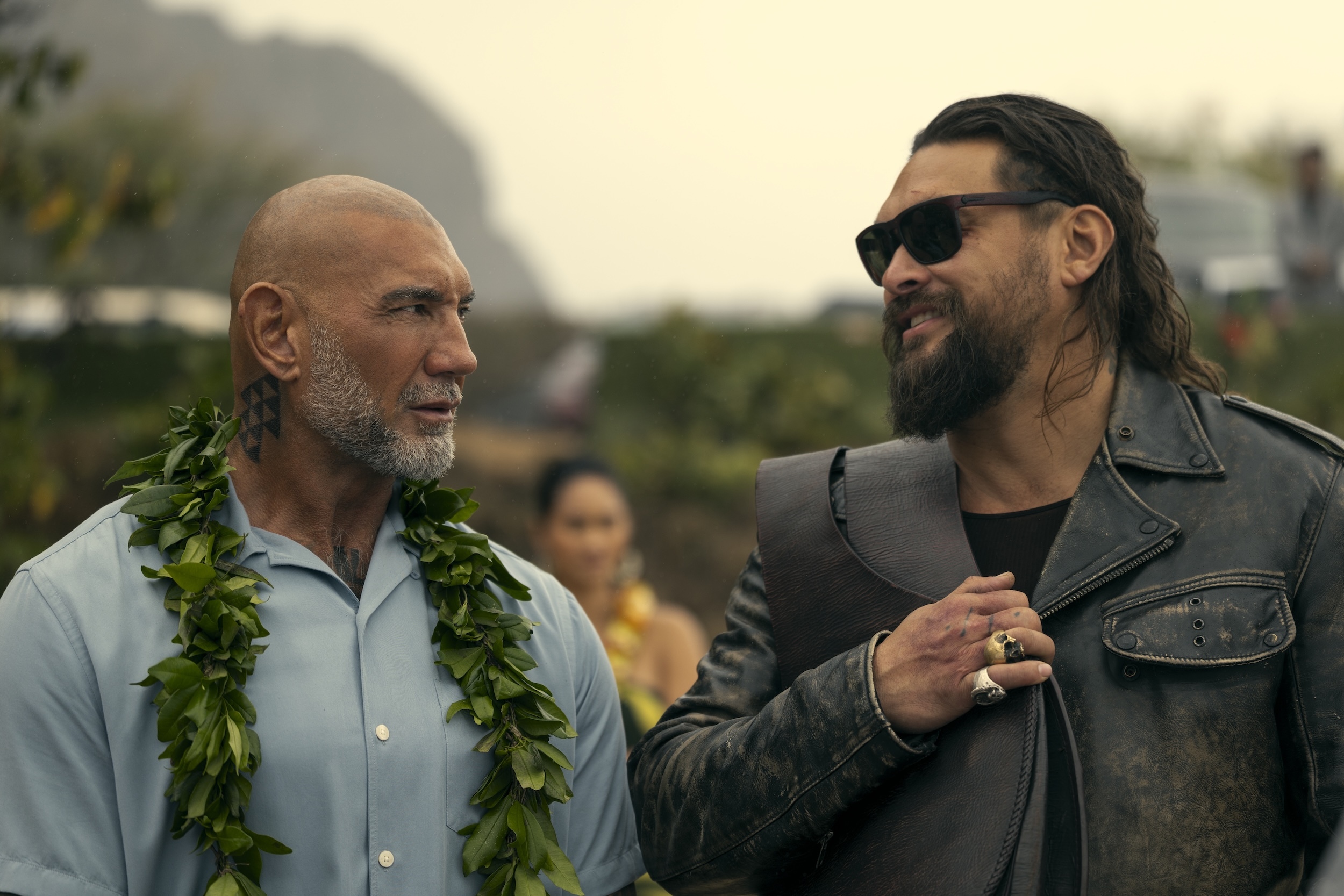 The estranged brothers James (Dave Bautista), left, and Jonny (Jason Momoa), right, star in this movie, "The Wrecking Crew," which releases this month.
