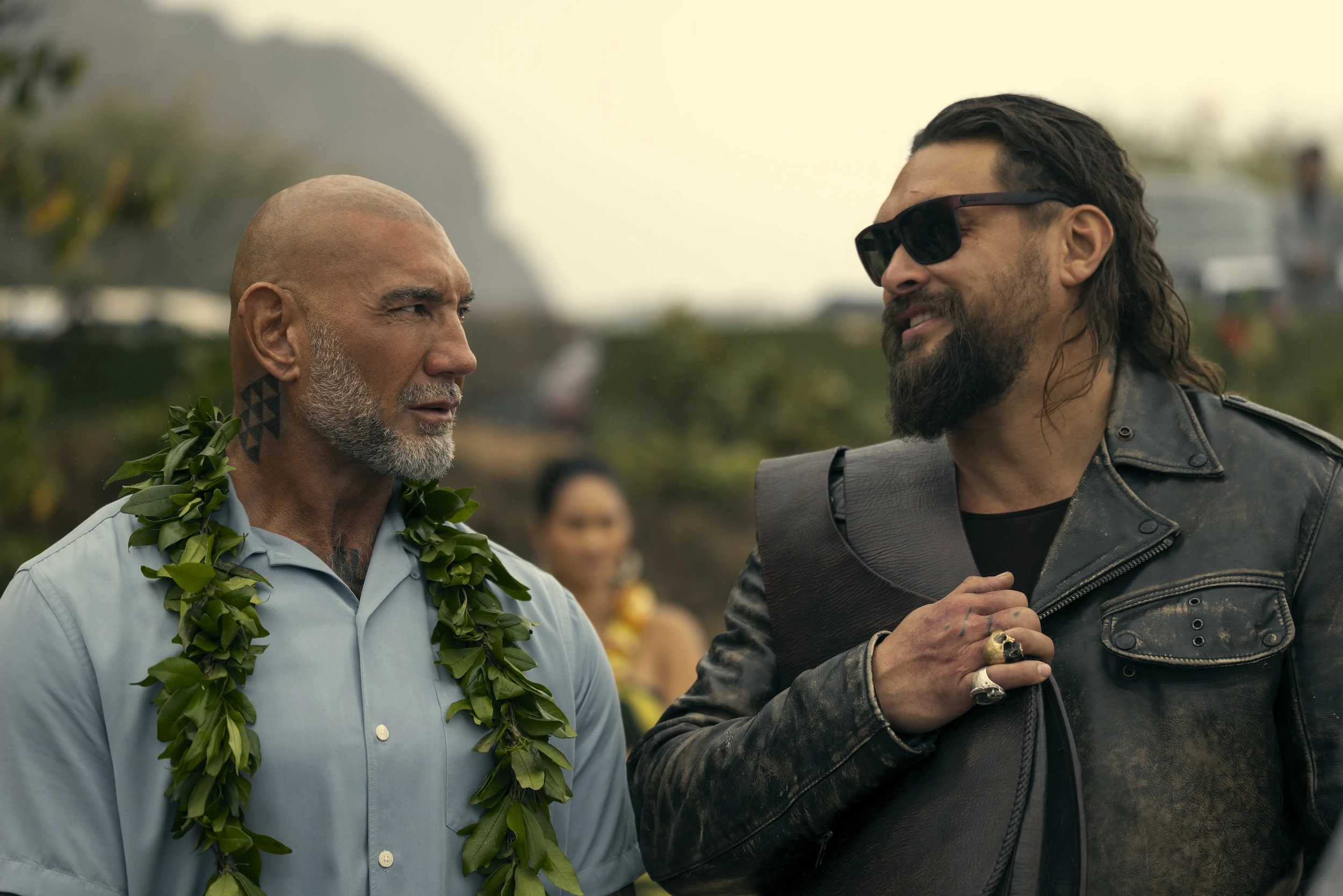The estranged brothers James (Dave Bautista), left, and Jonny (Jason Momoa), right, star in this movie, "The Wrecking Crew," which releases this month.
