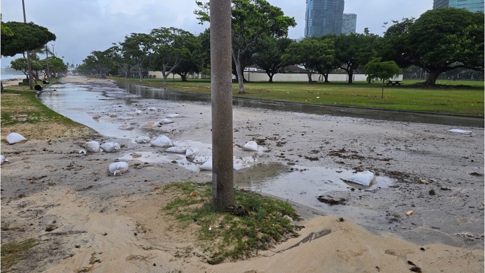 Flooding and debris at Ala Moana Beach Park Tuesday.