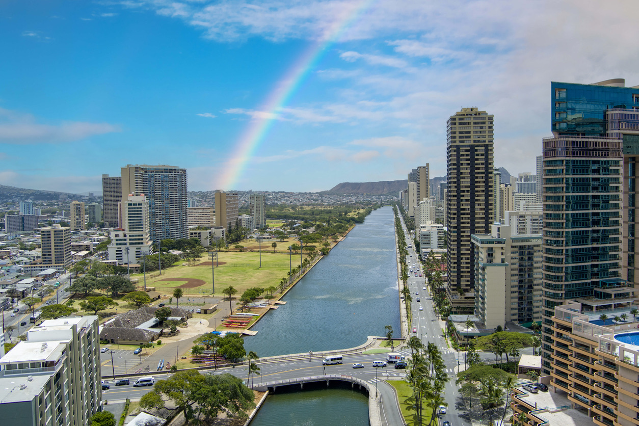 Ala Wai Canal with skyscrapers, hotels and condos in Honolulu
