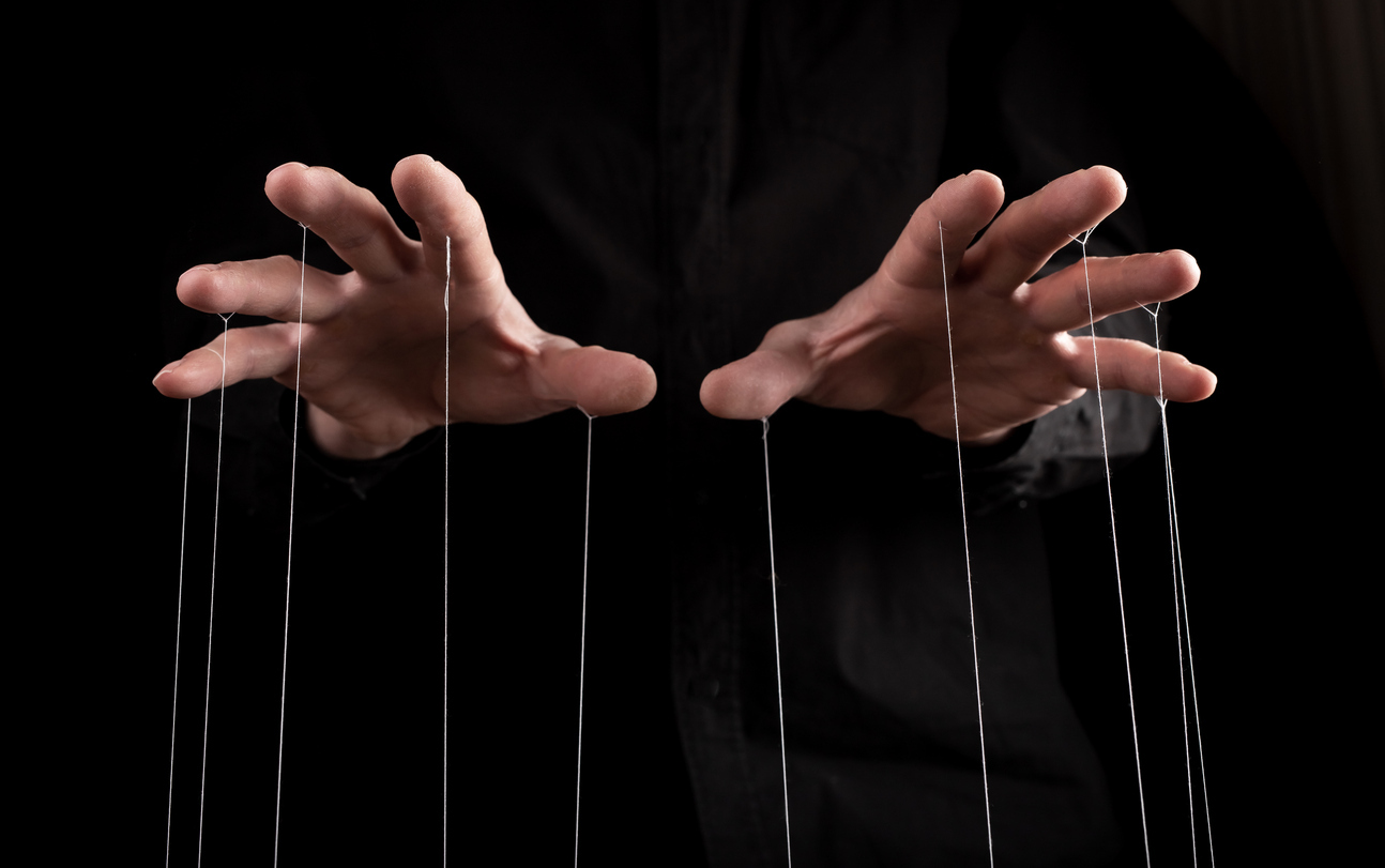 puppet master pulling strings