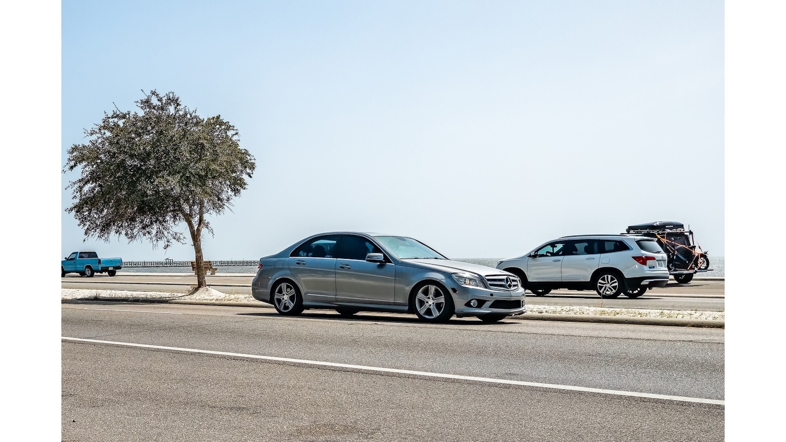 A Mercedes-Benz on the road.